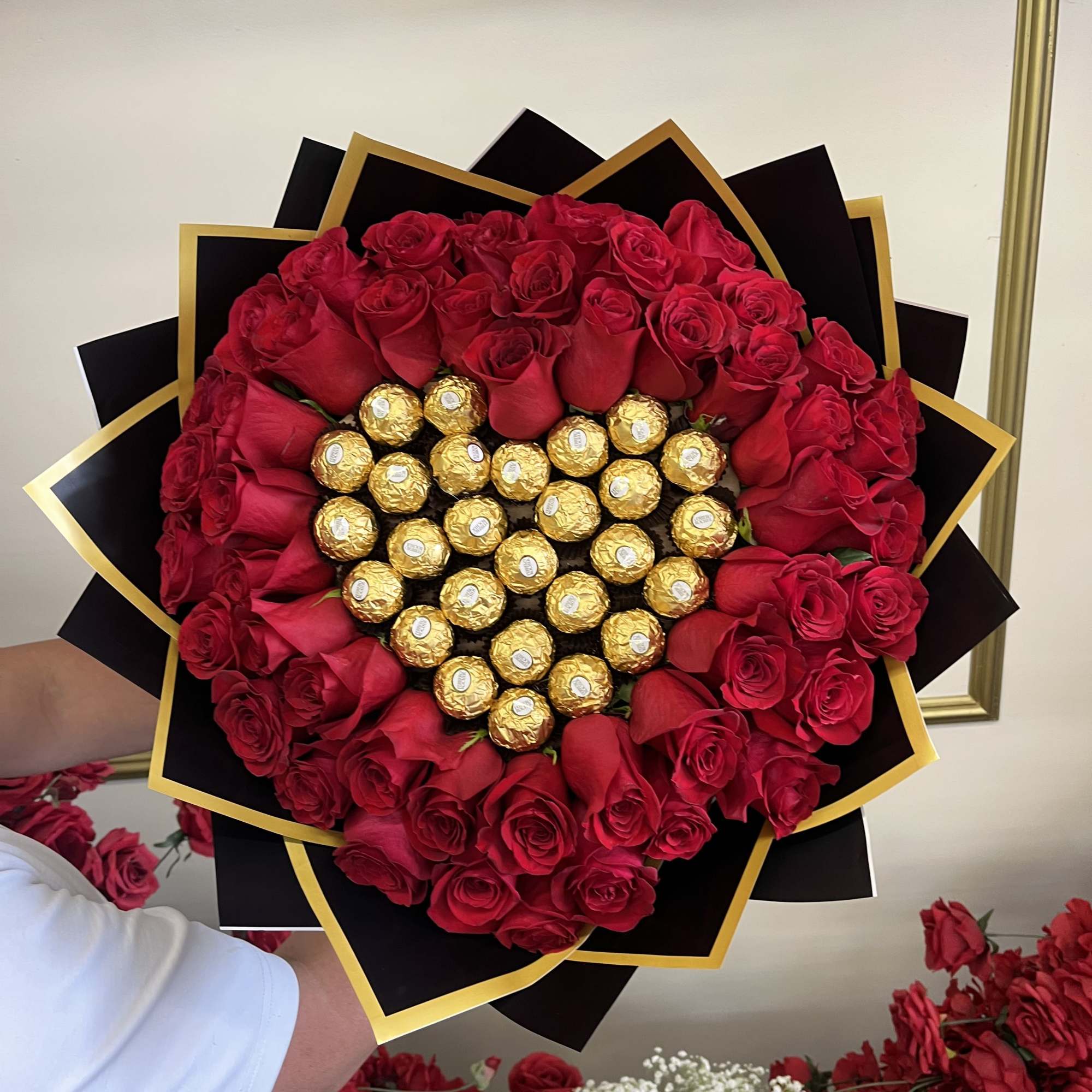 A Valentine&rsquo;s chocolate bouquet featuring a Ferrero Rocher heart at the center