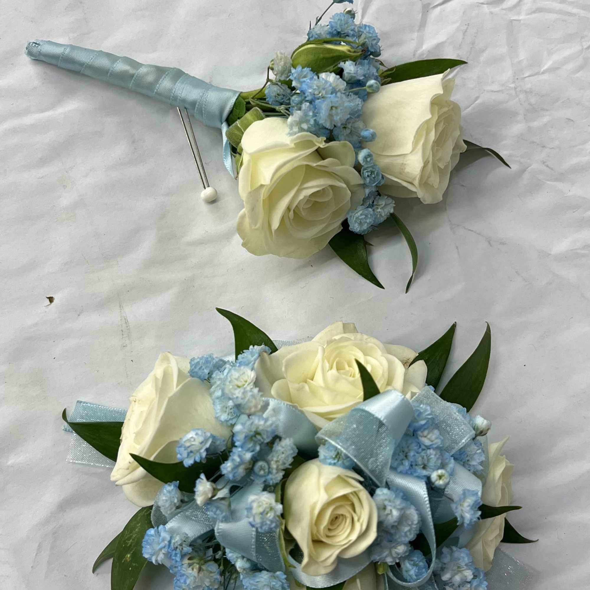 White rose corsage and boutonniere set accented with baby&rsquo;s breath for a, photo 3 of 4
