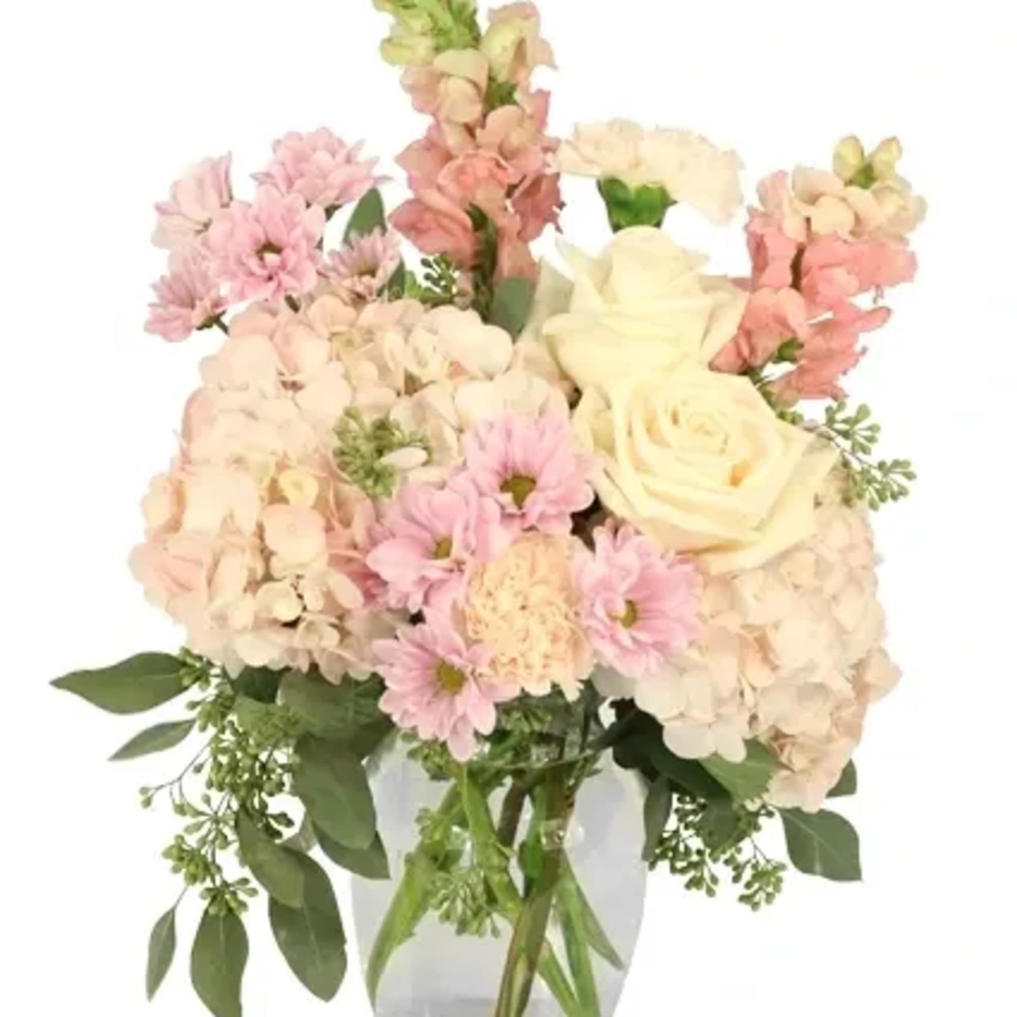Celebrate love with this enchanting arrangement of soft pastels, featuring hydrangeas, roses