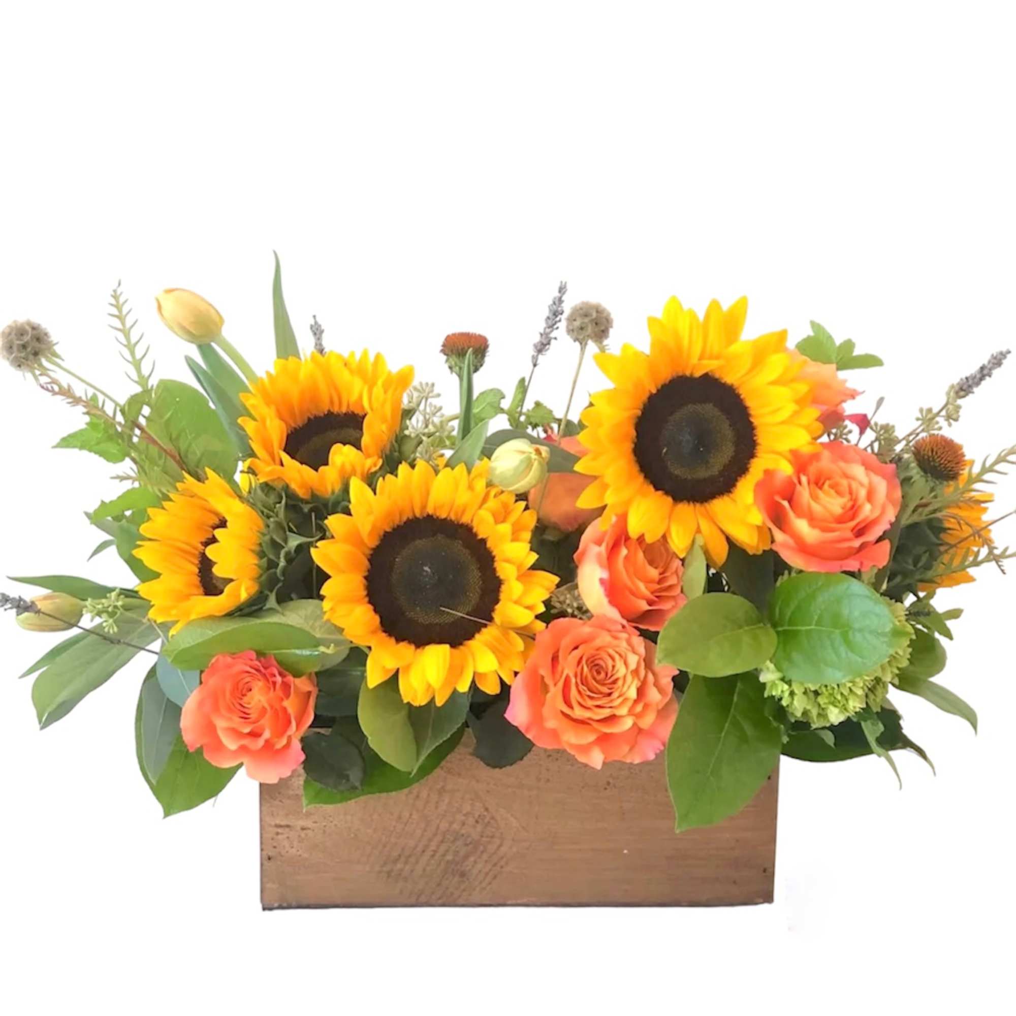 Sunflowers and orange roses arranged in a wooden box