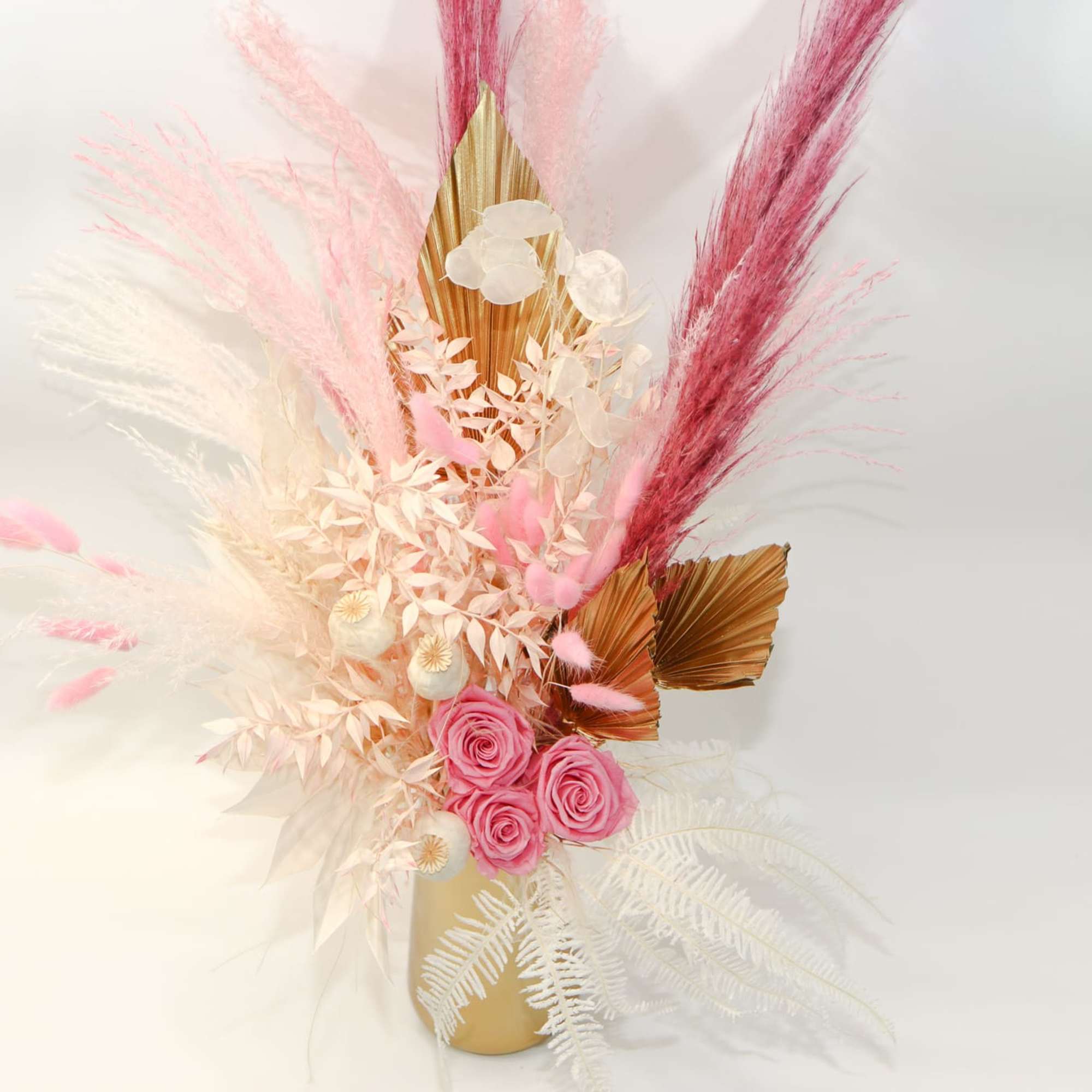 Pink roses and dried pampas-style stems in a gold vase, photo 4 of 4