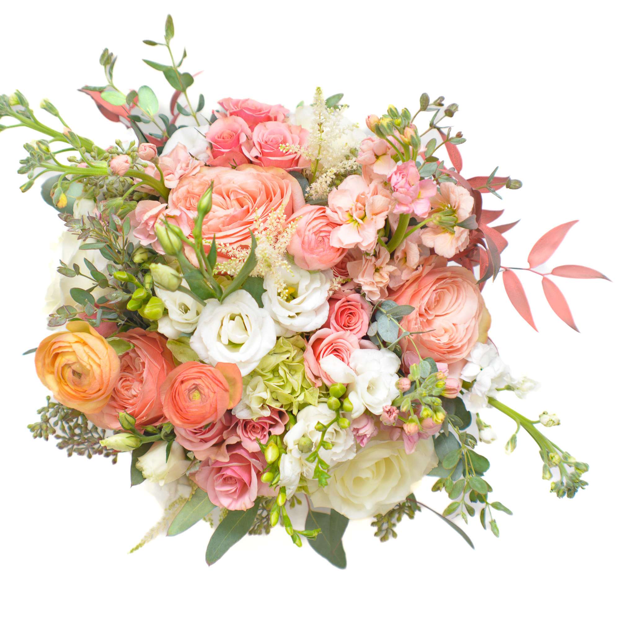 Bouquet of pink, peach, and white flowers with greenery