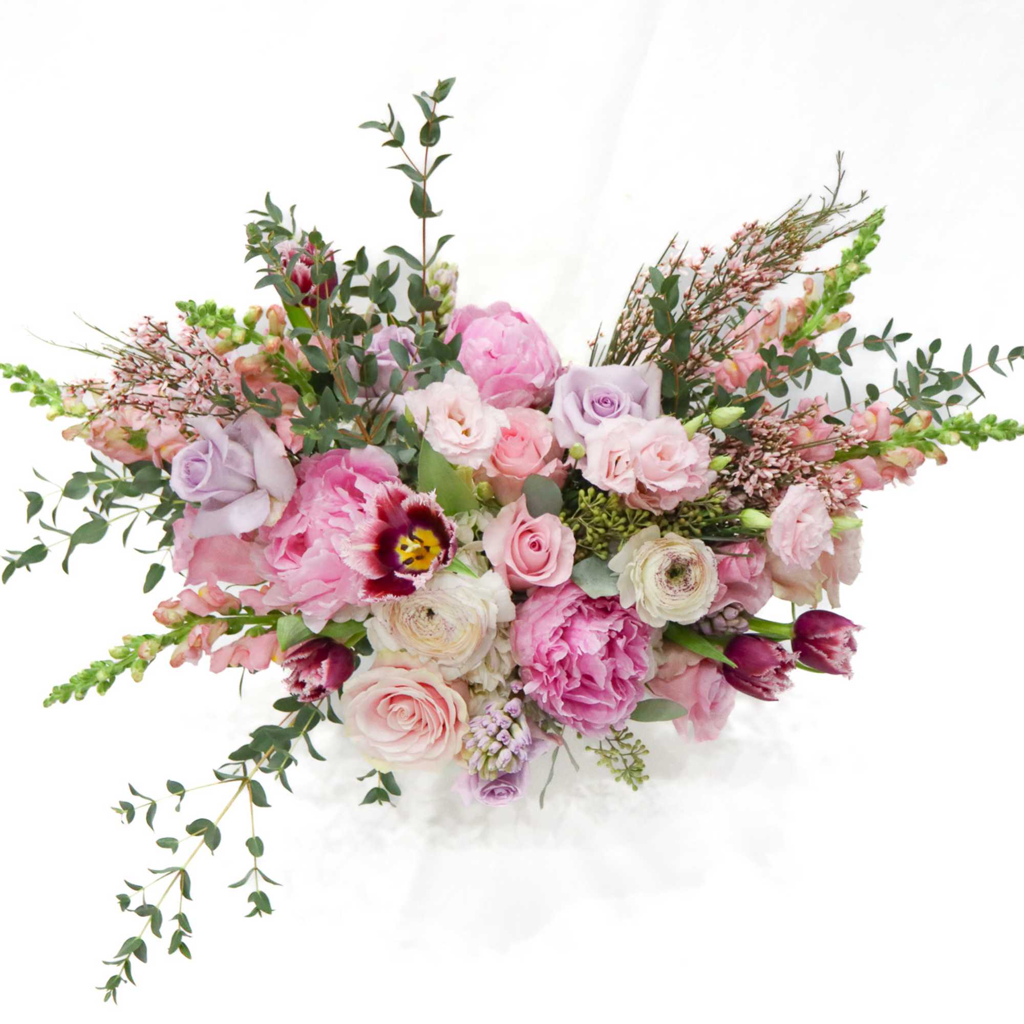 Pink and lavender bouquet with roses and mixed blooms