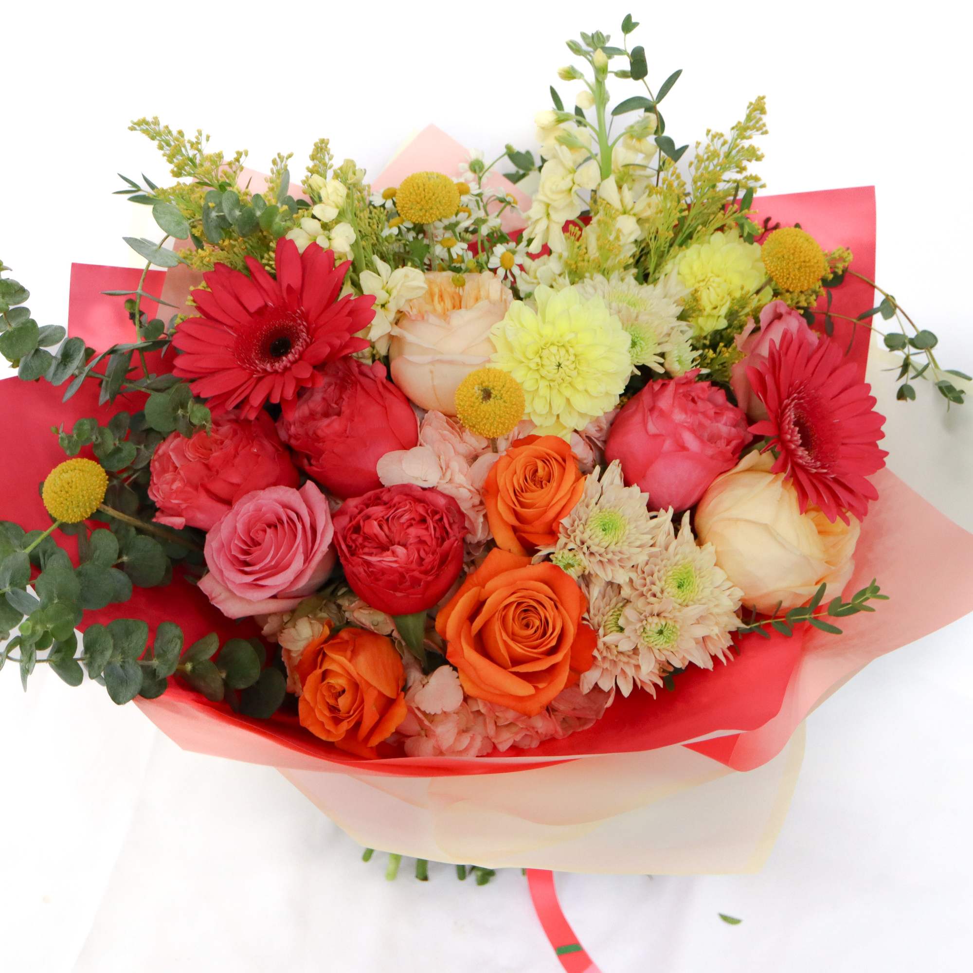 Summer Fling
Bursting with bold pinks, fiery oranges, and pops of sunny yellow, photo 4 of 4