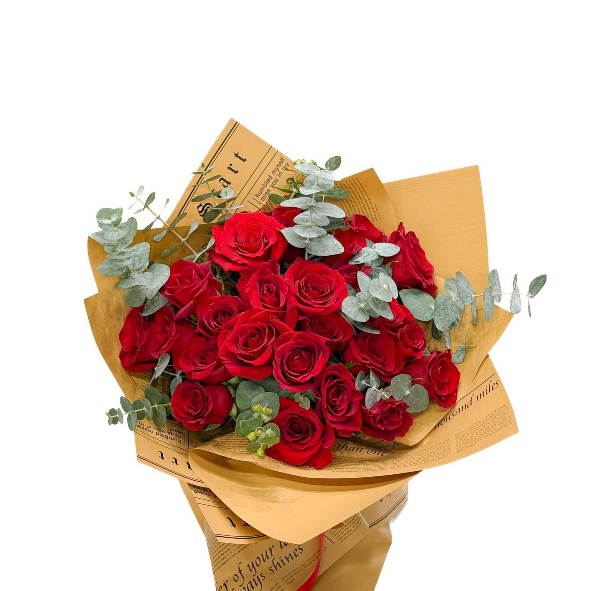 Bouquet of red roses wrapped in tan paper with eucalyptus, photo 3 of 4