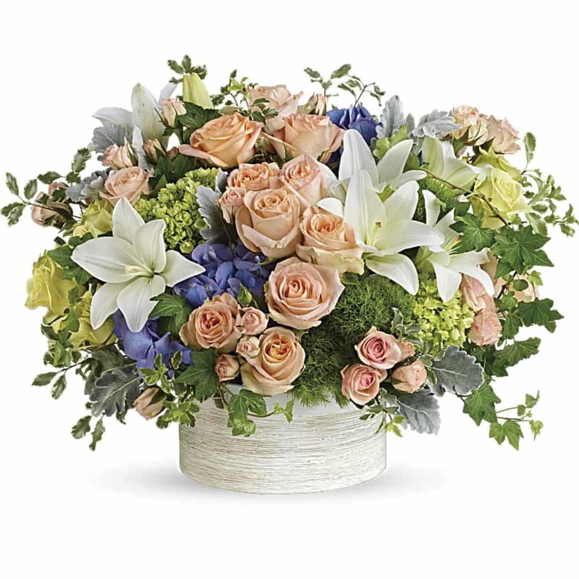 Peach roses and white lilies in a round white vase, photo 2 of 3