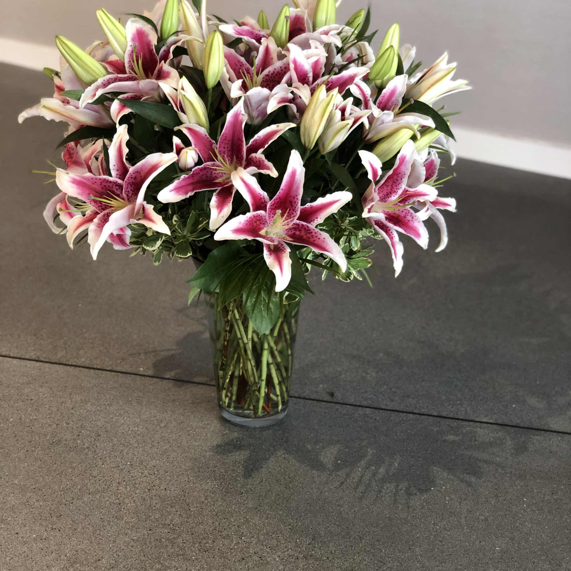 STARGAZER LILIES IN A VASE BY TWIN TOWERS FLORIST IN ARLINGTON, VA
