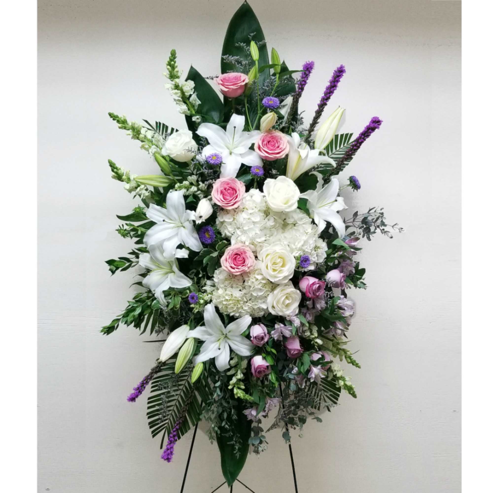 WHITE, PINK, AND LAVENDER STANDING SPRAY BY TWIN TOWERS FLORIST

TT-SPRAY18