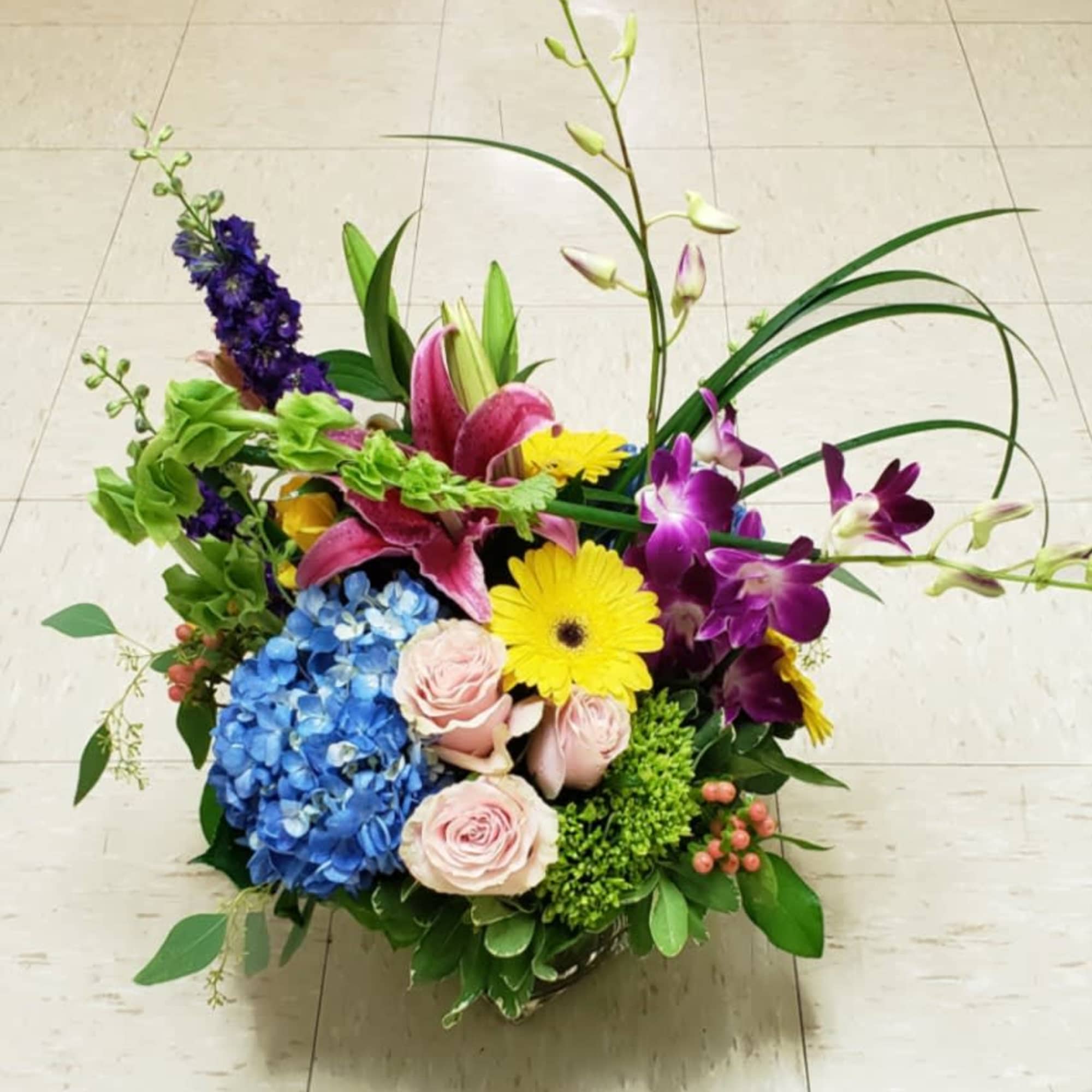  SUMMERY CONTEMPO  by Twin Towers Florist, Arlington

Comes arranged in a