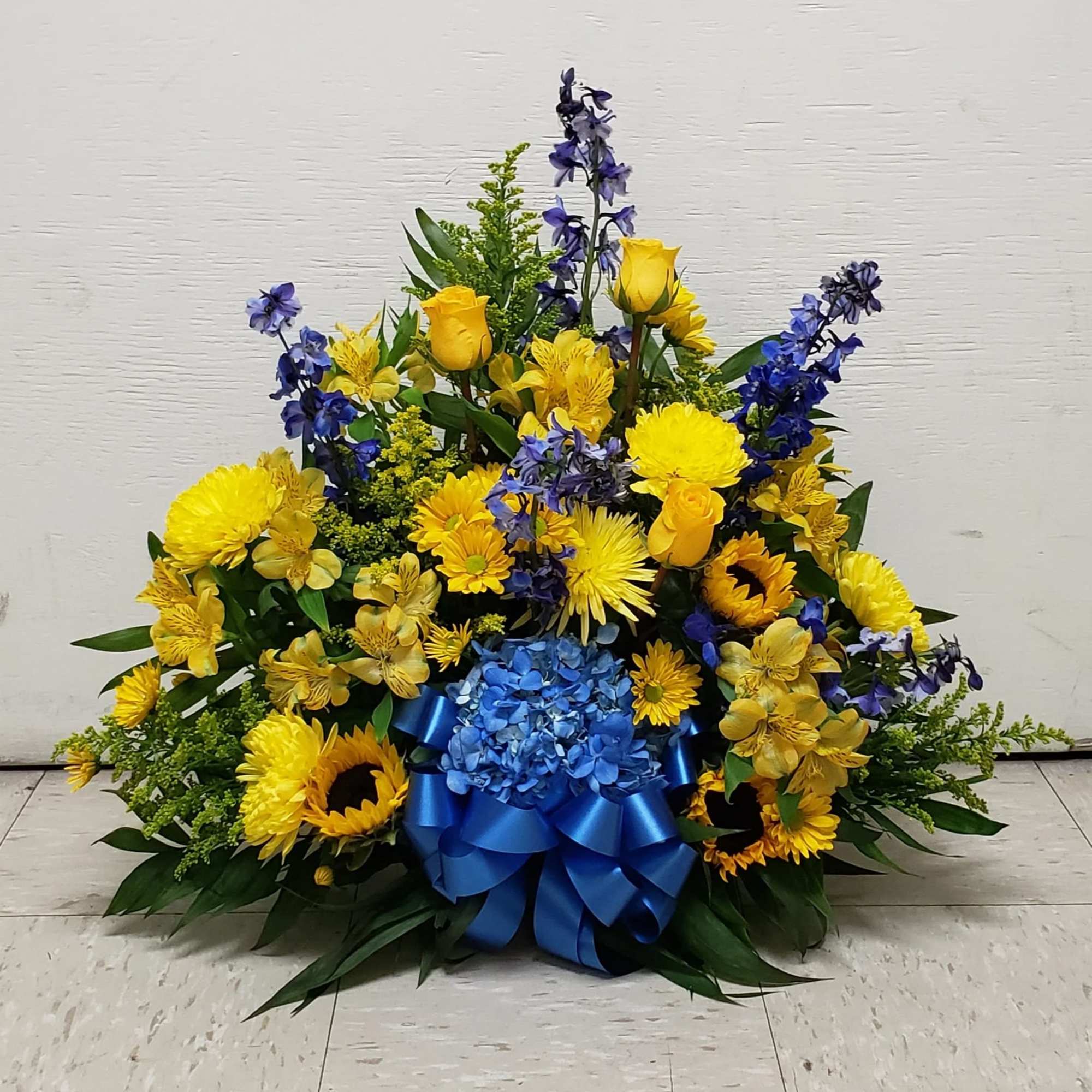 BLUE AND GOLD CEMETERY CENTERPIECE - DELUXE by Twin Towers Florist, Arlington