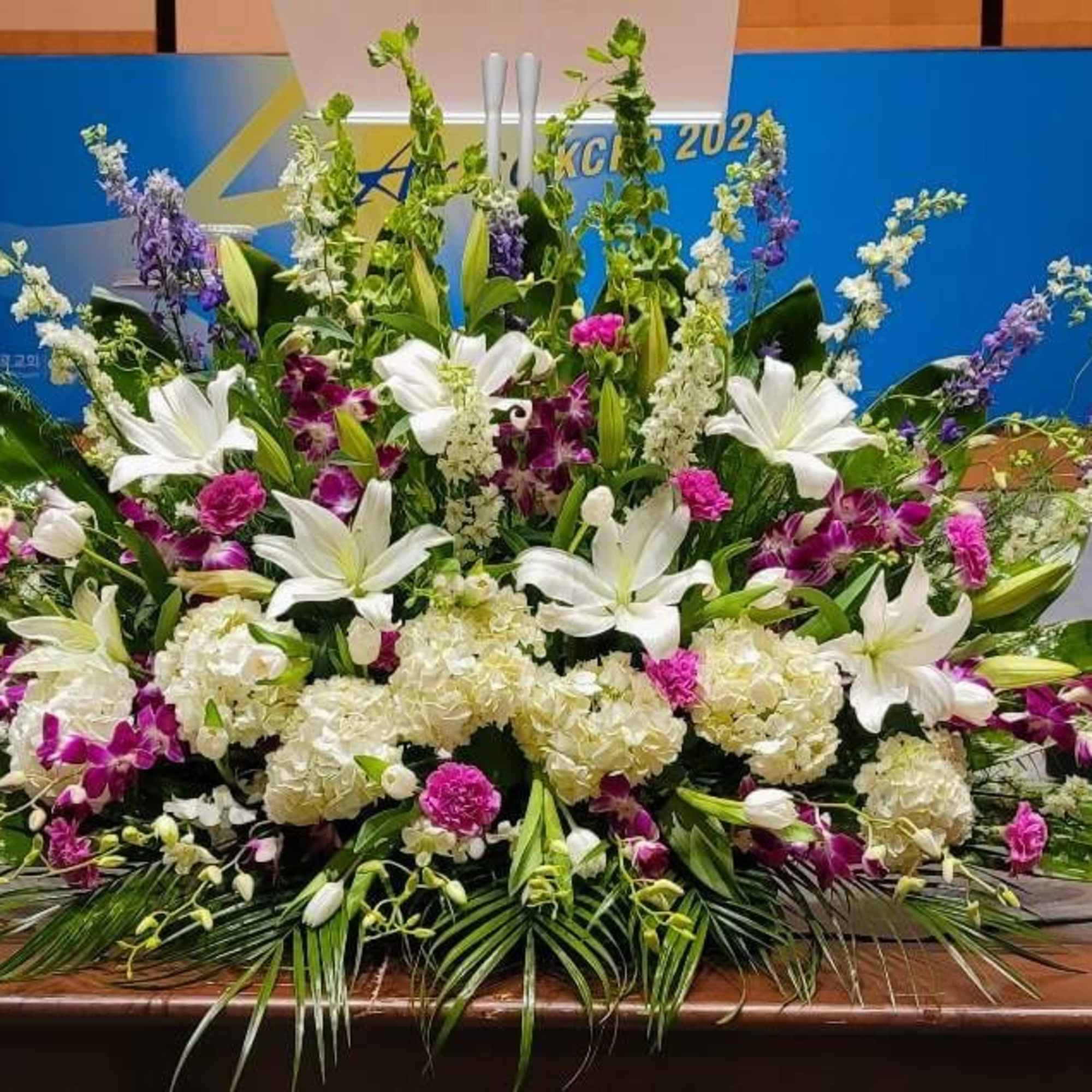 PODIUM ARRANGEMENT 154 BY TWIN TOWERS FLORIST IN ARLINGTON, VA.
, photo 2 of 2