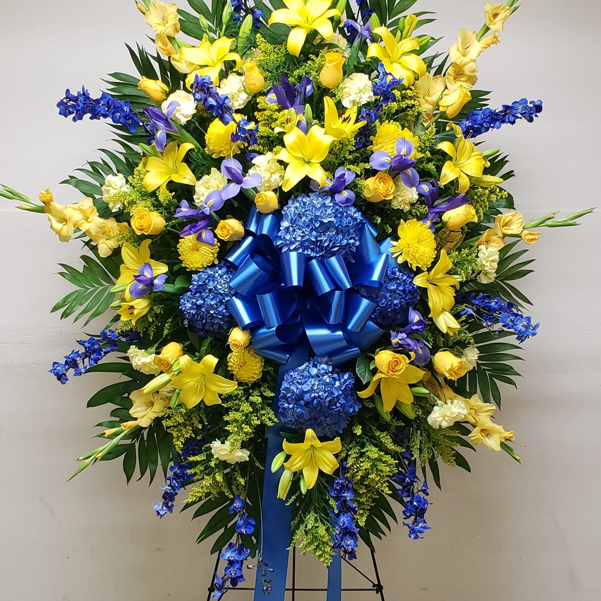 GRAND BLUE AND GOLD SPRAY BY TWIN TOWERS FLORIST IN ARLINGTON, VA