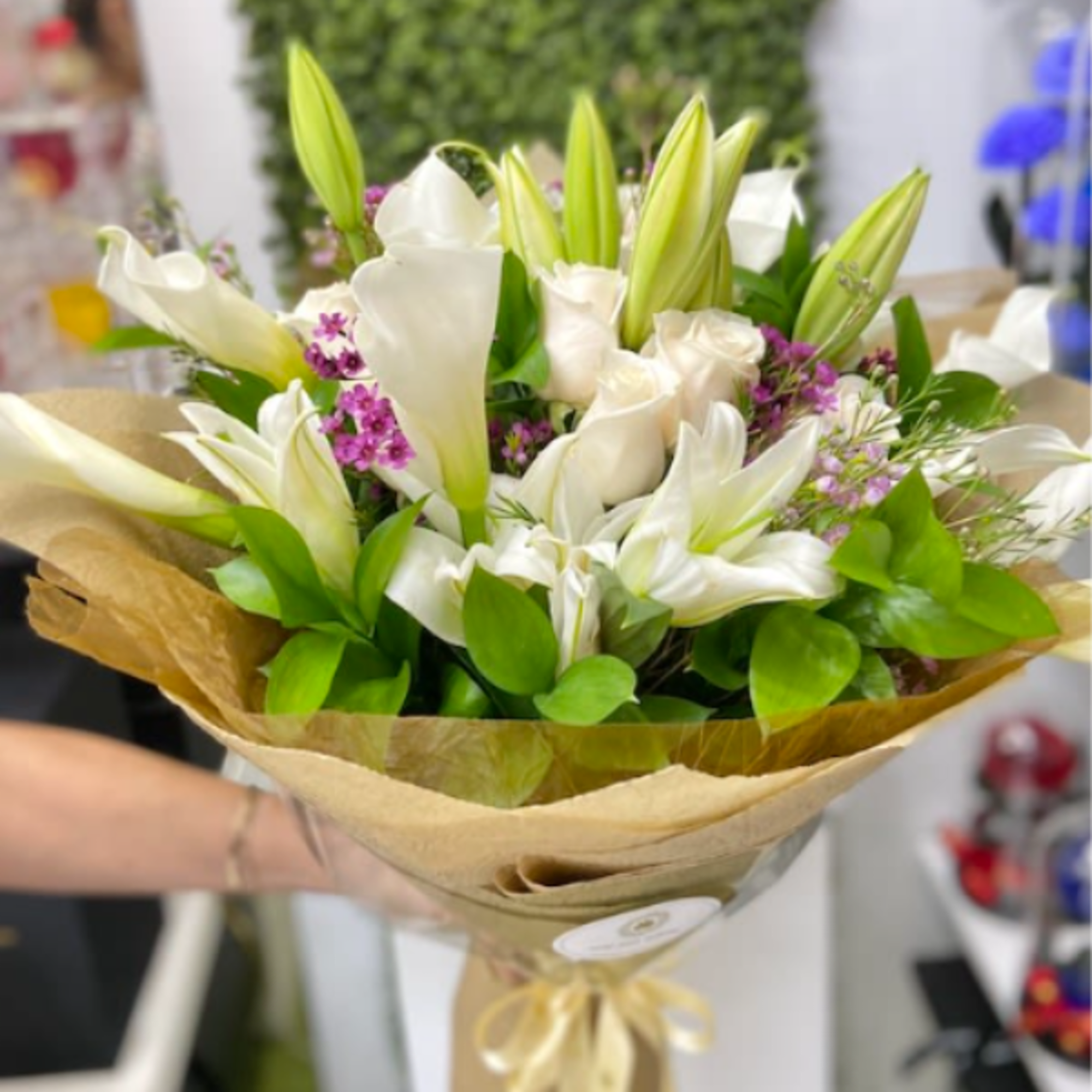 Blanc Rose Bouquet: Callas with some roses and lilies Euro wrapped in