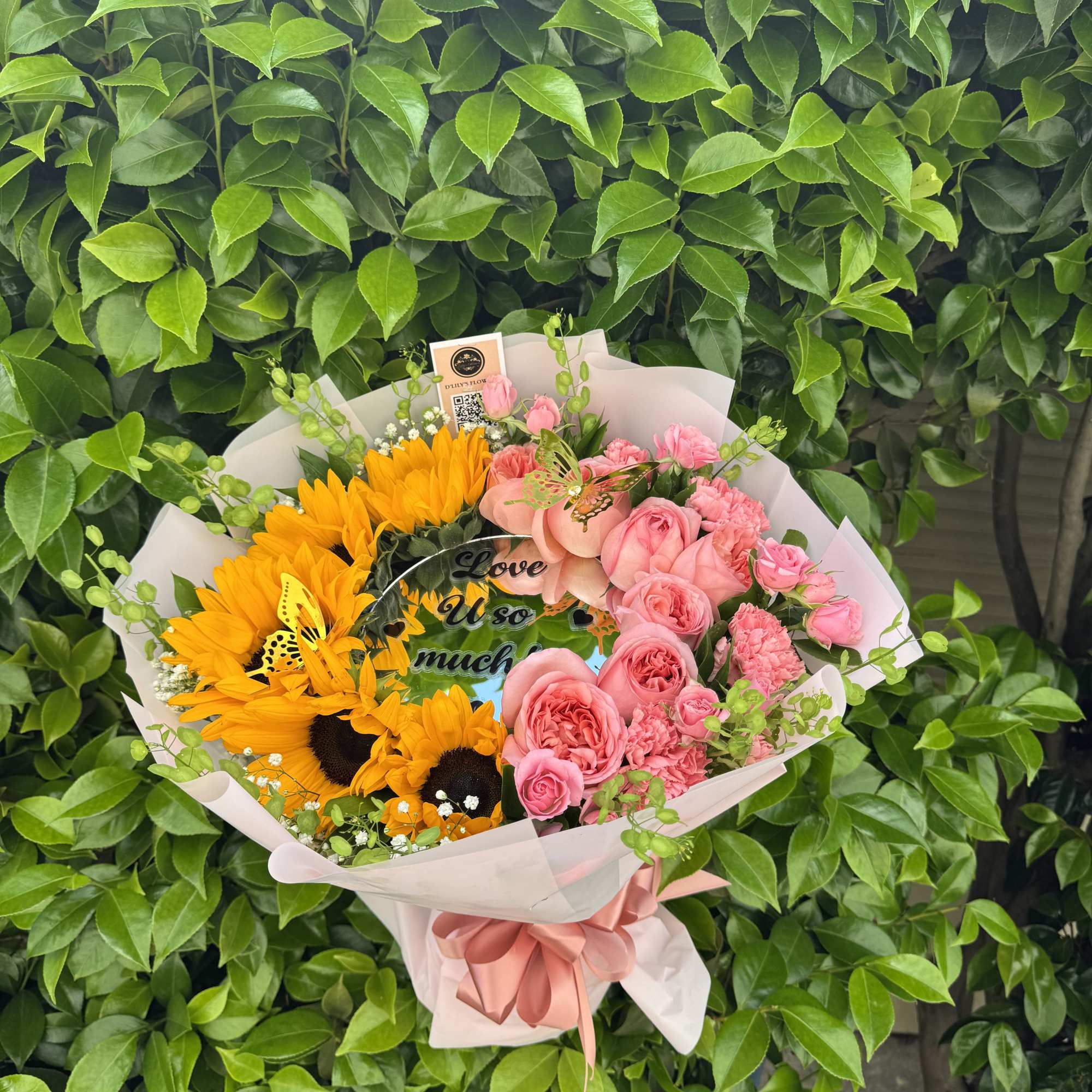 A sweet mix of sunny blooms and soft pink petals, made to, photo 2 of 2