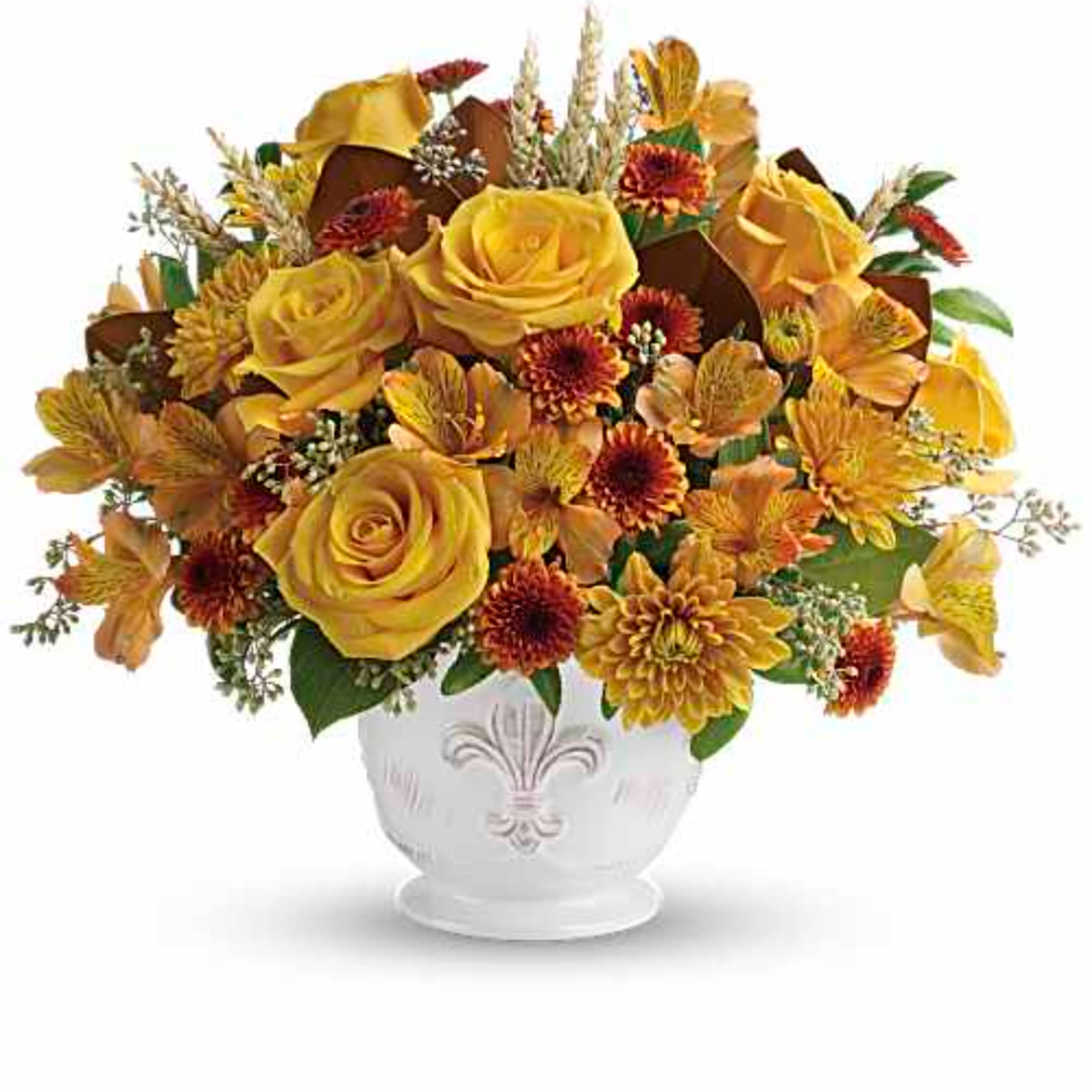 Yellow roses and autumn flowers arranged in a white vase