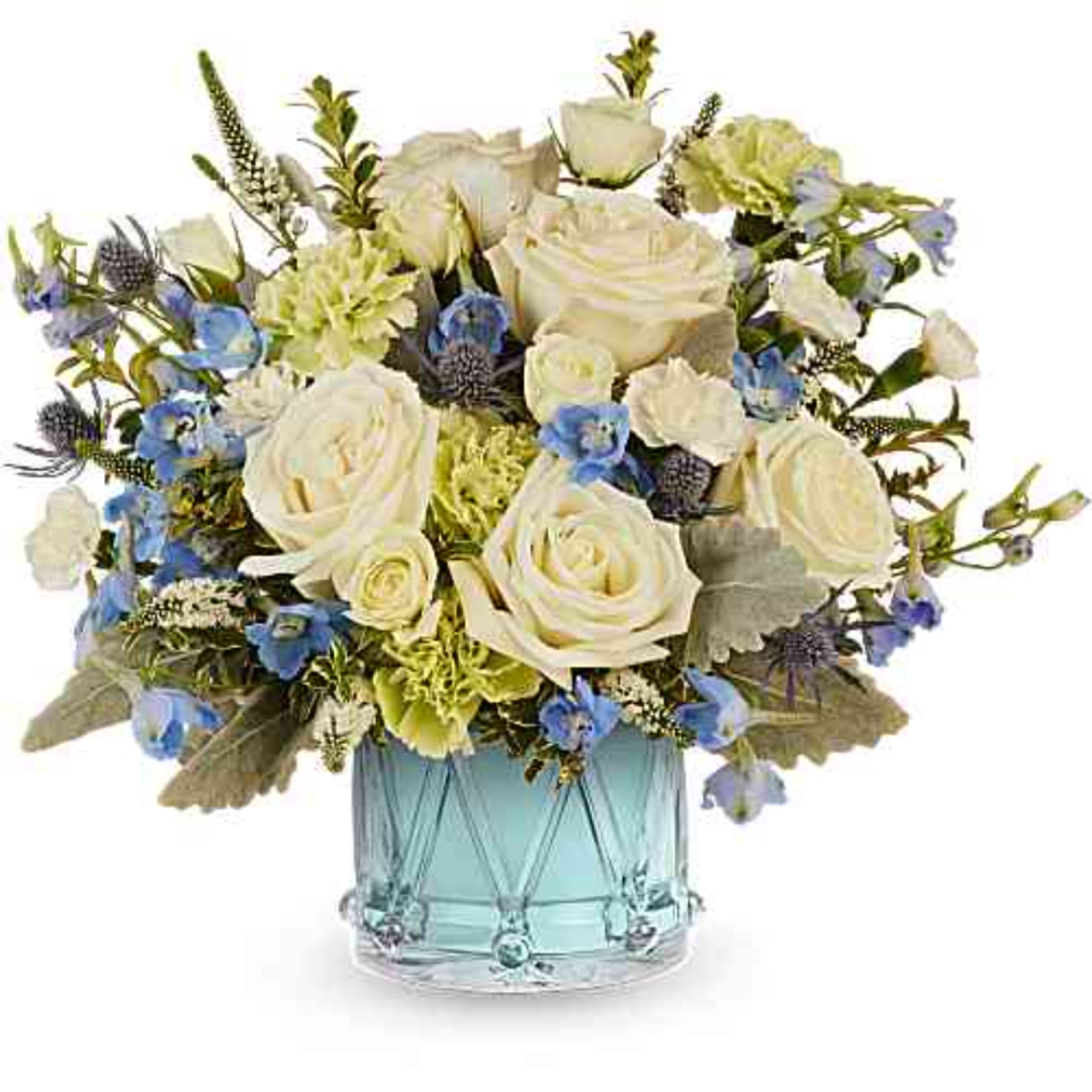 White roses and blue flowers arranged in a blue glass vase