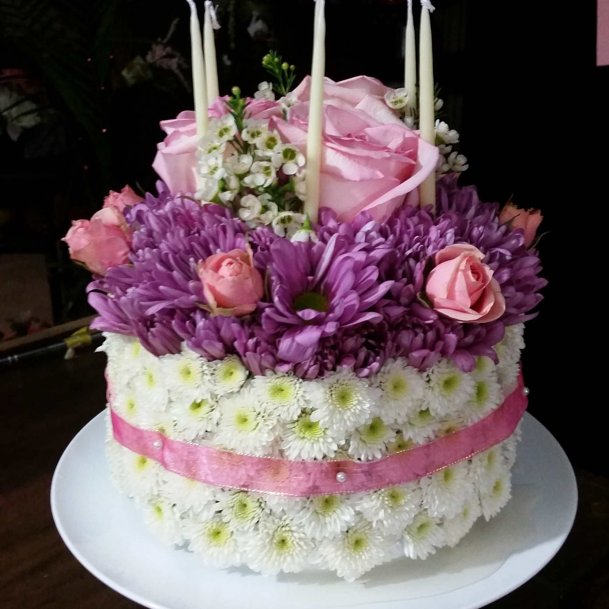 They'll never forget this incredible birthday surprise! Spray roses, pompons and mums