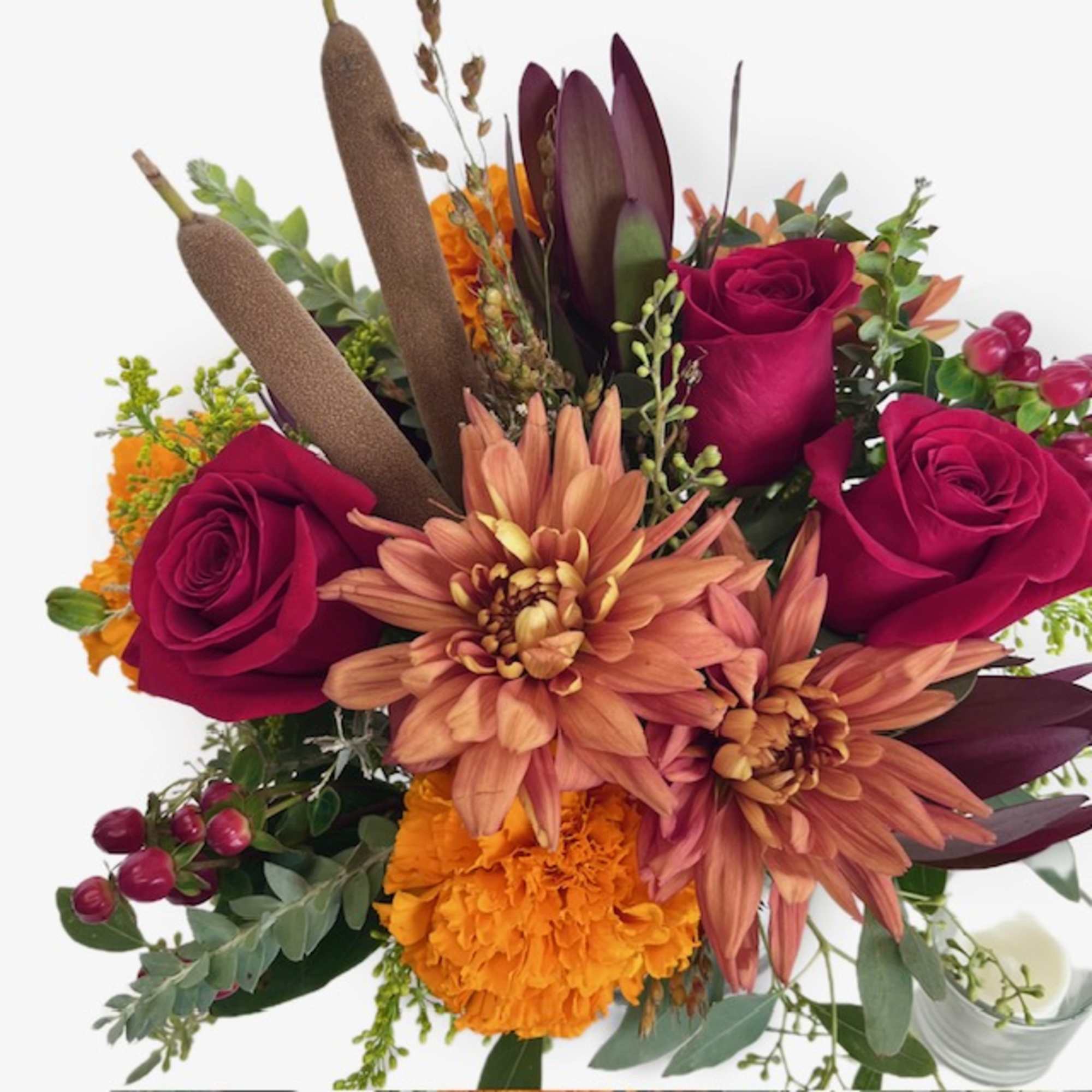 This arrangement features both the richness and earthiness of the season. Long, photo 2 of 2