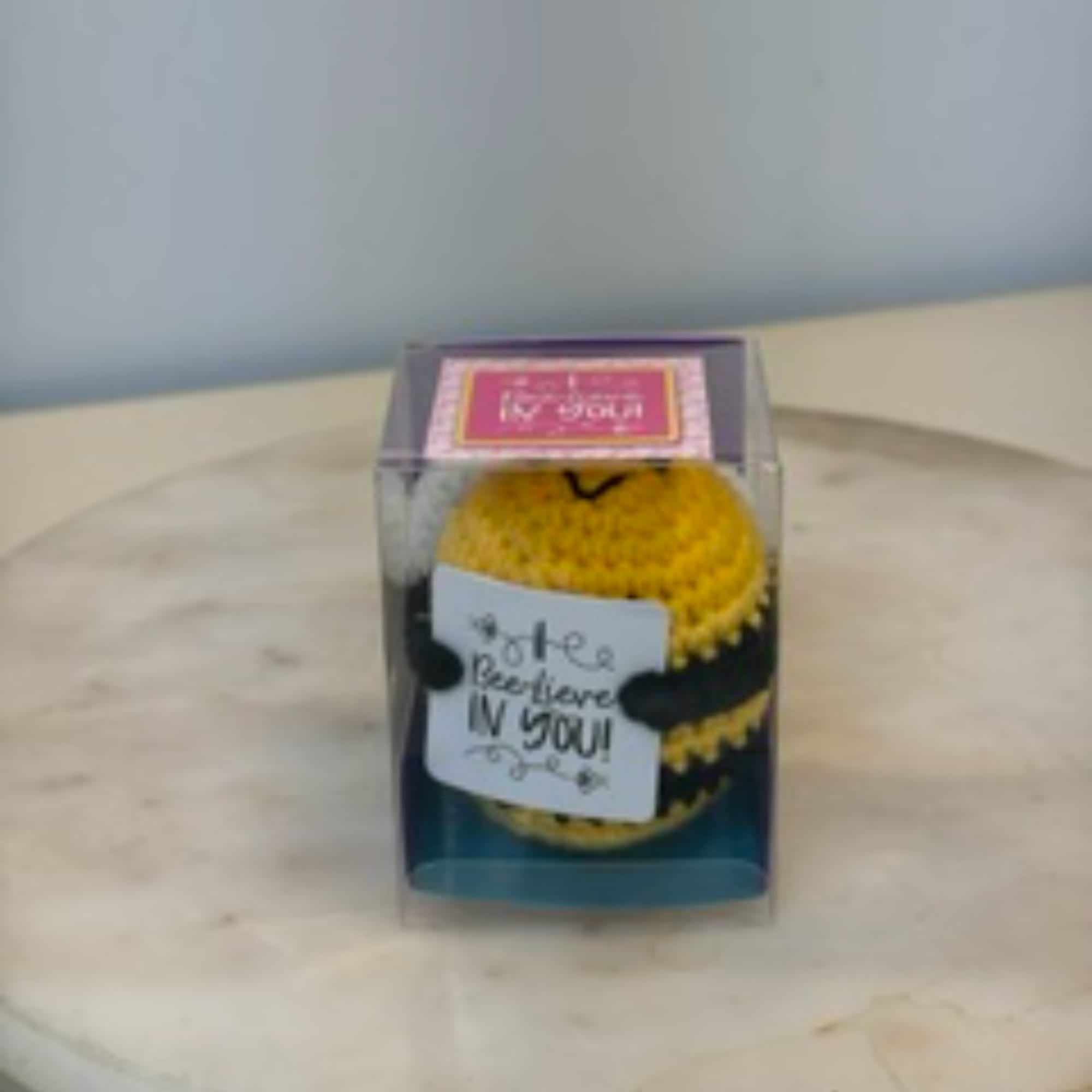 Yellow and black beaded bracelet in a clear gift box
