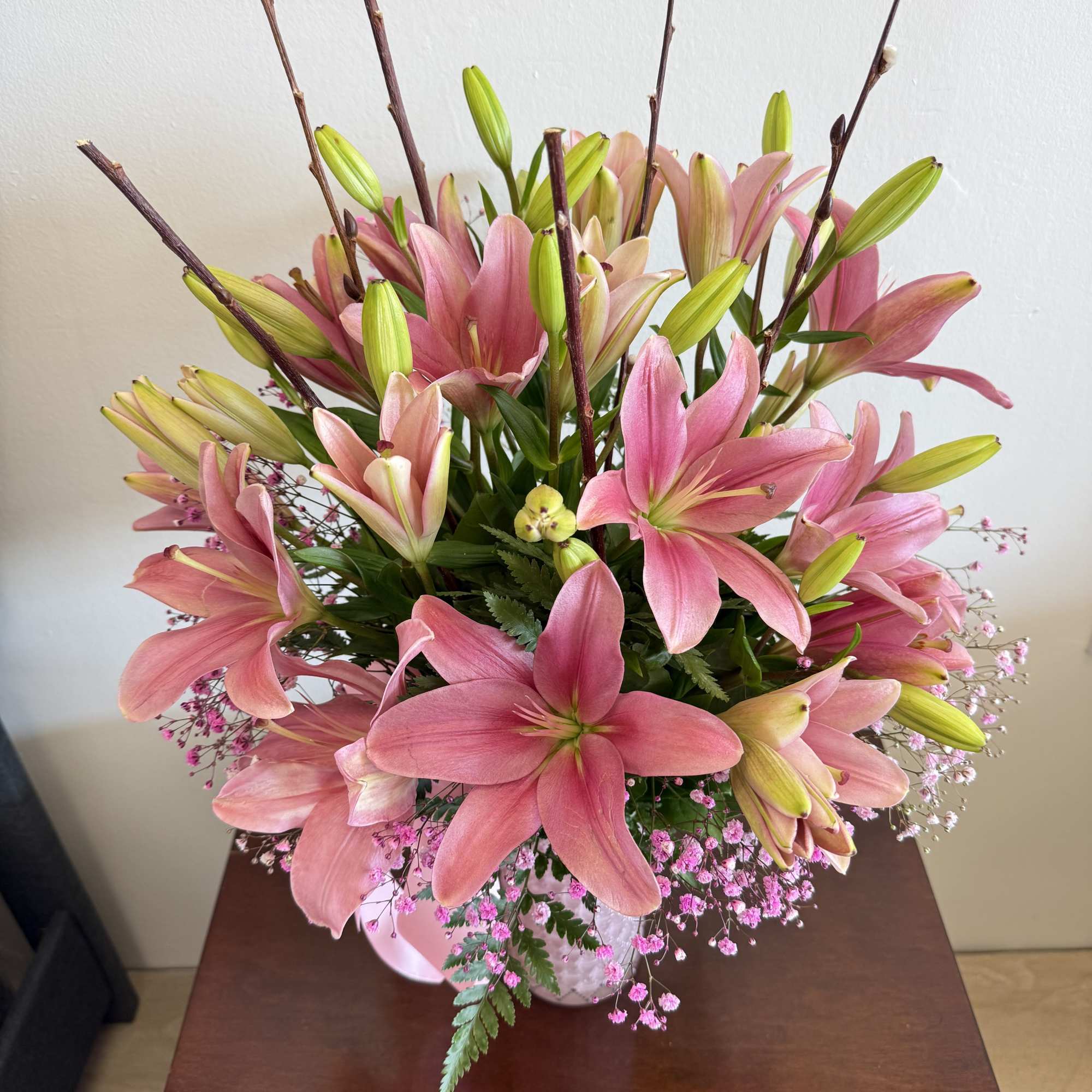 This stunning lily bouquet in a fancy pink vase, photo 2 of 2