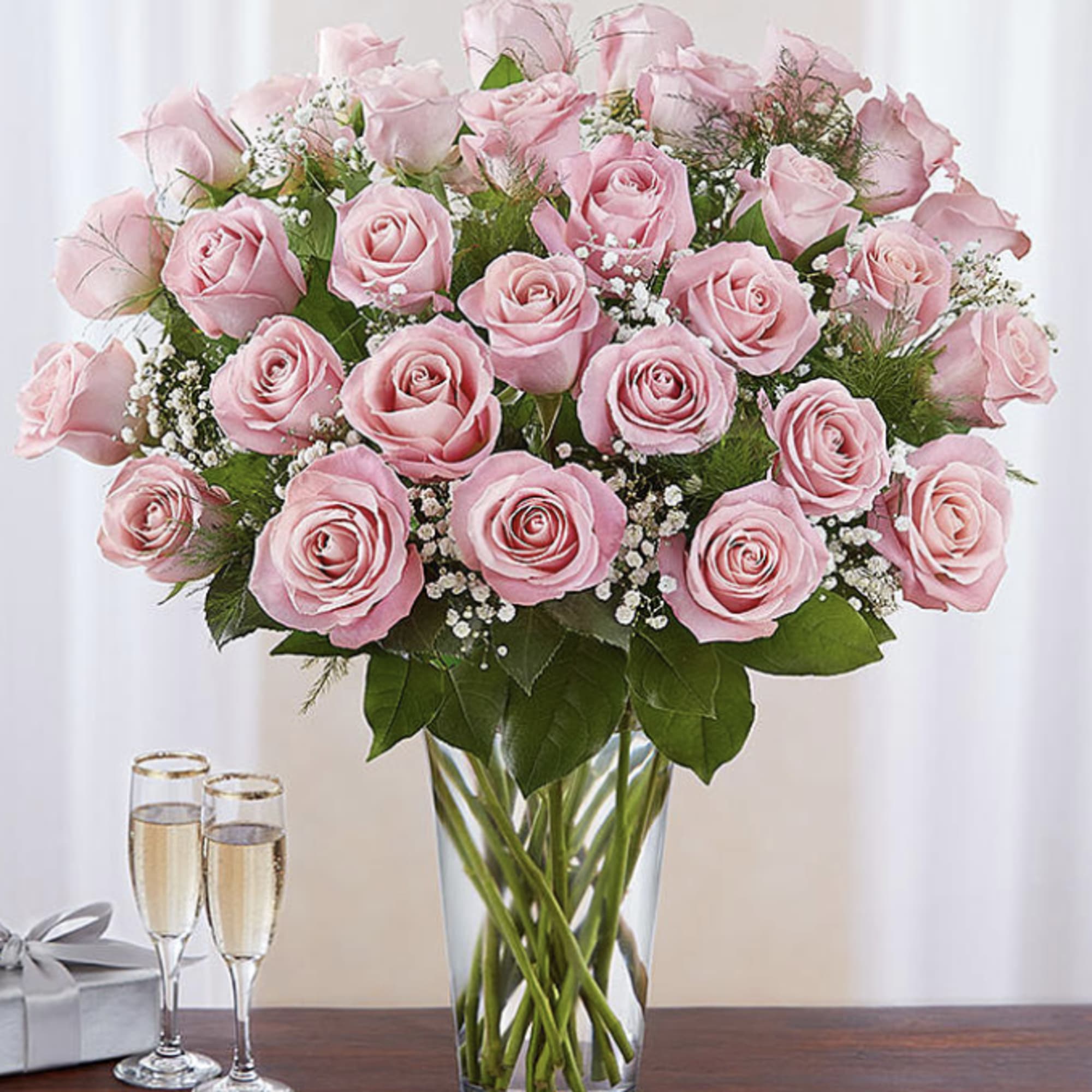These pink roses are cheerful and fun! Dozen Long Stemmed Pink Roses