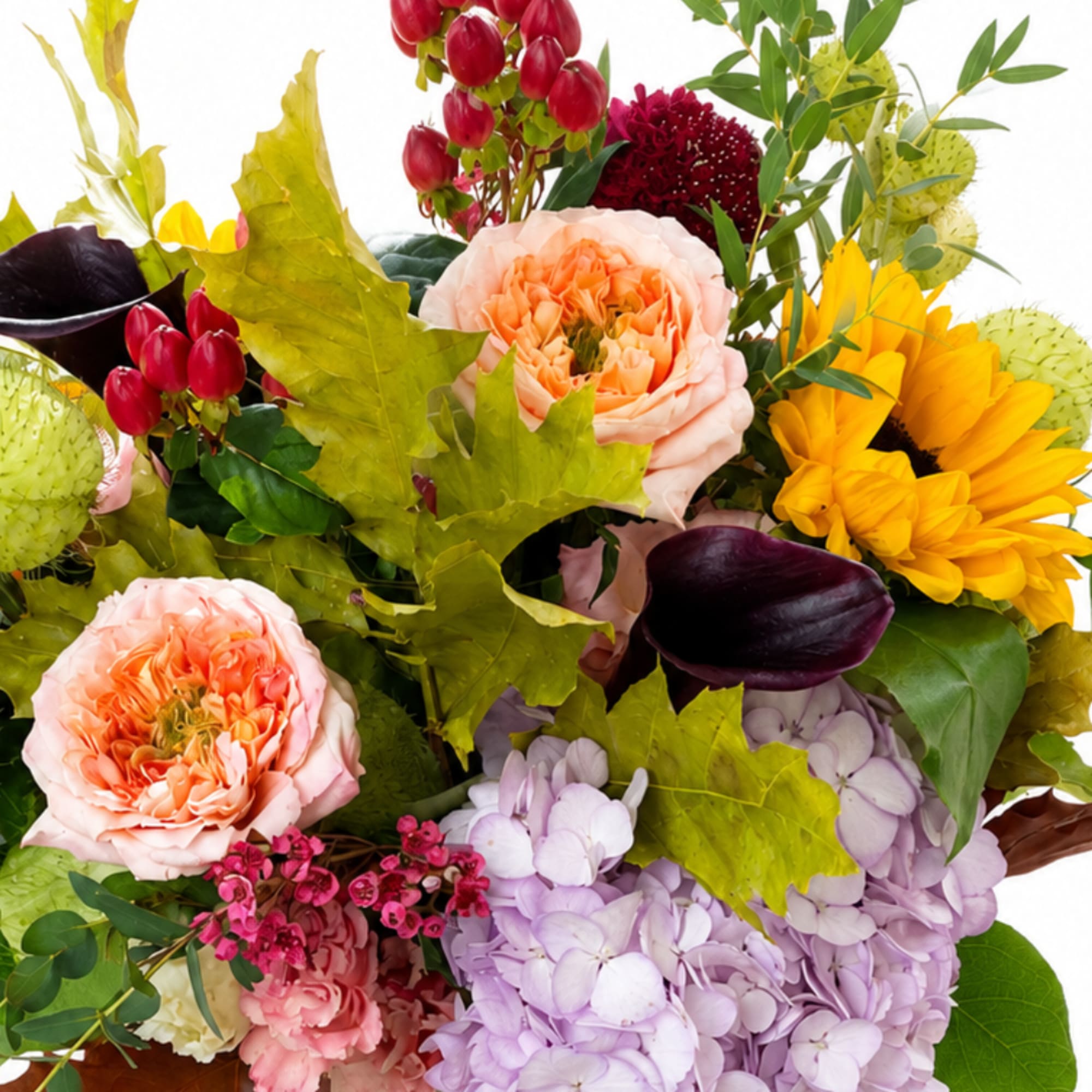 Mixed bouquet with peach roses, yellow sunflowers, and lavender hydrangeas