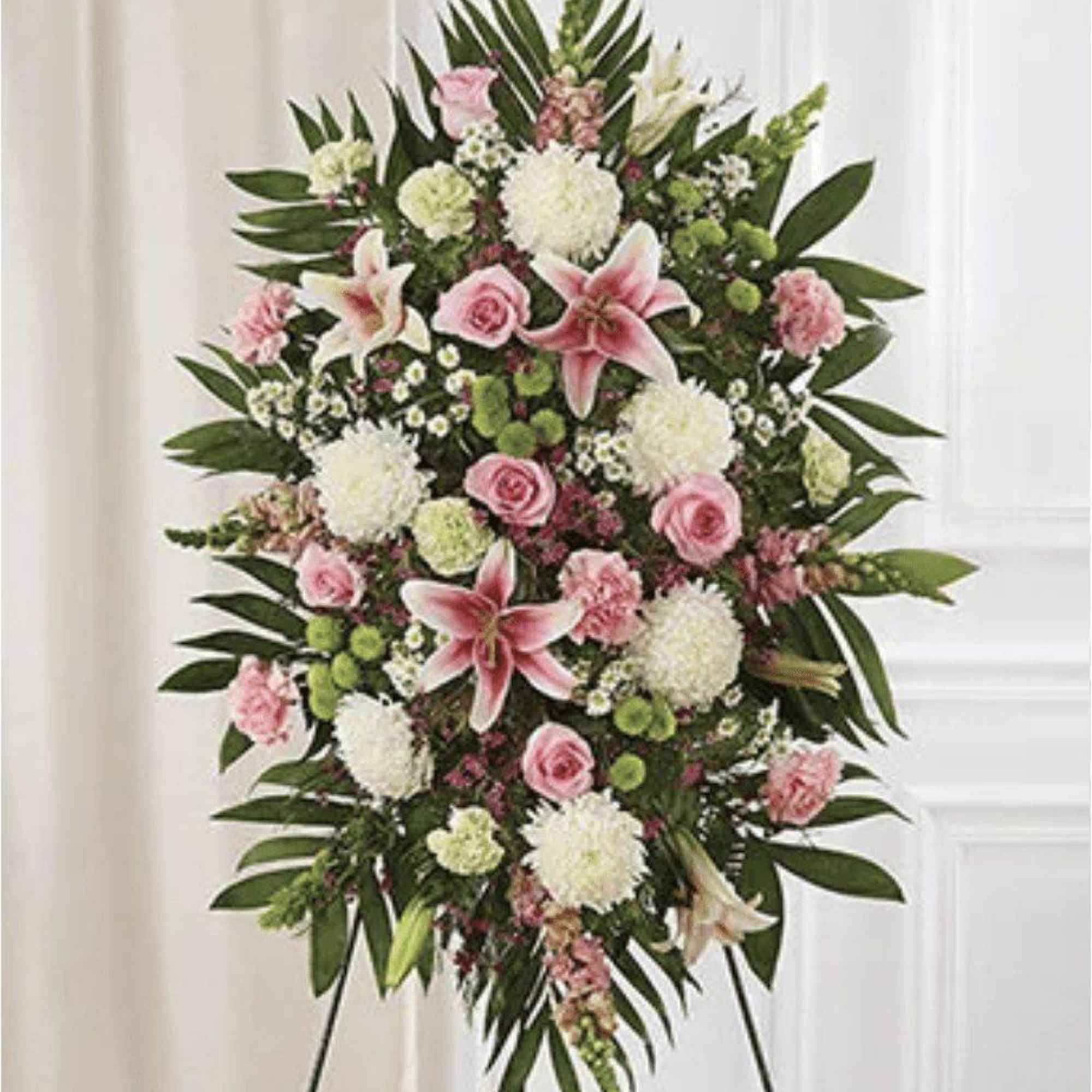 Standing floral spray with pink lilies, roses, and white blooms