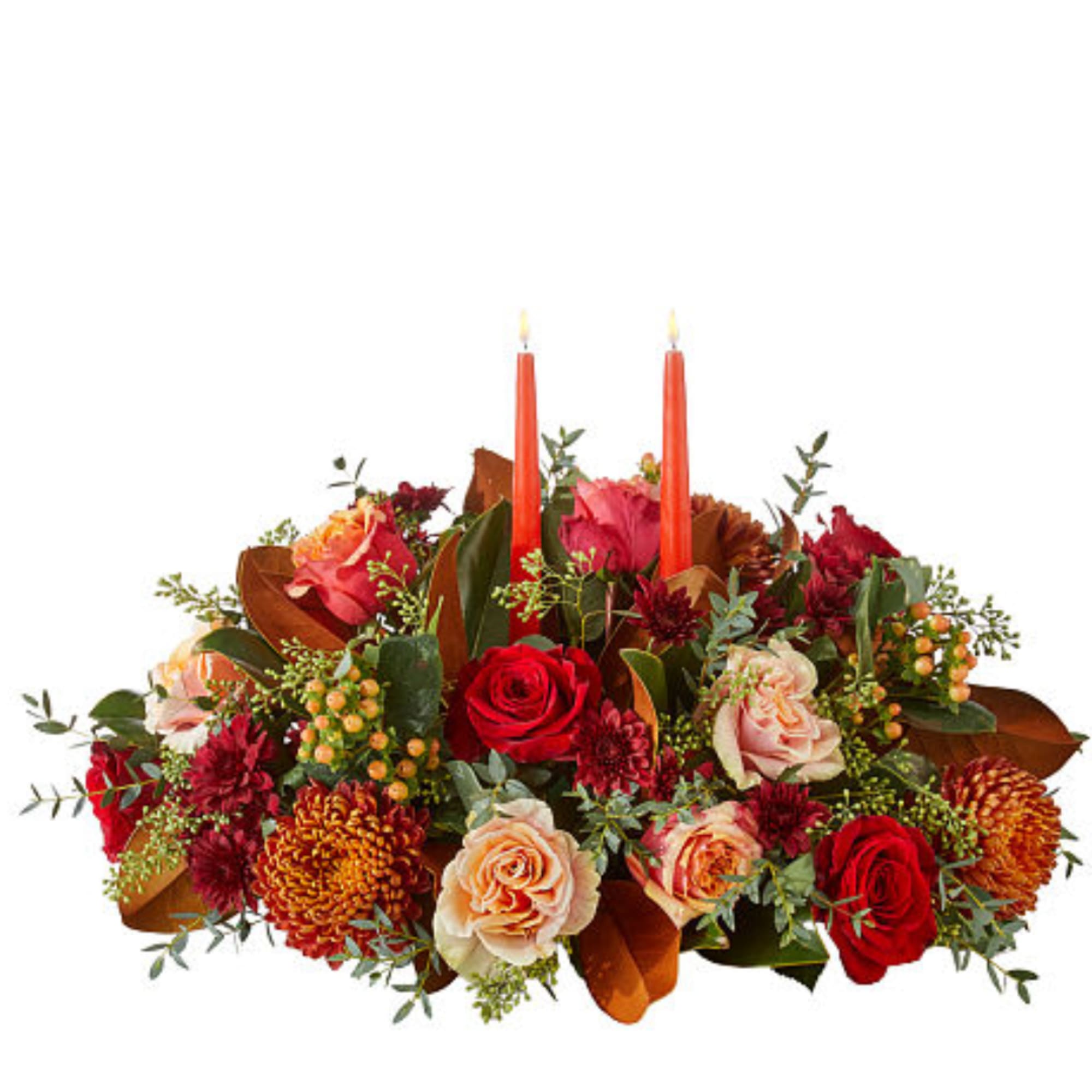 Autumn floral centerpiece with roses and two orange taper candles