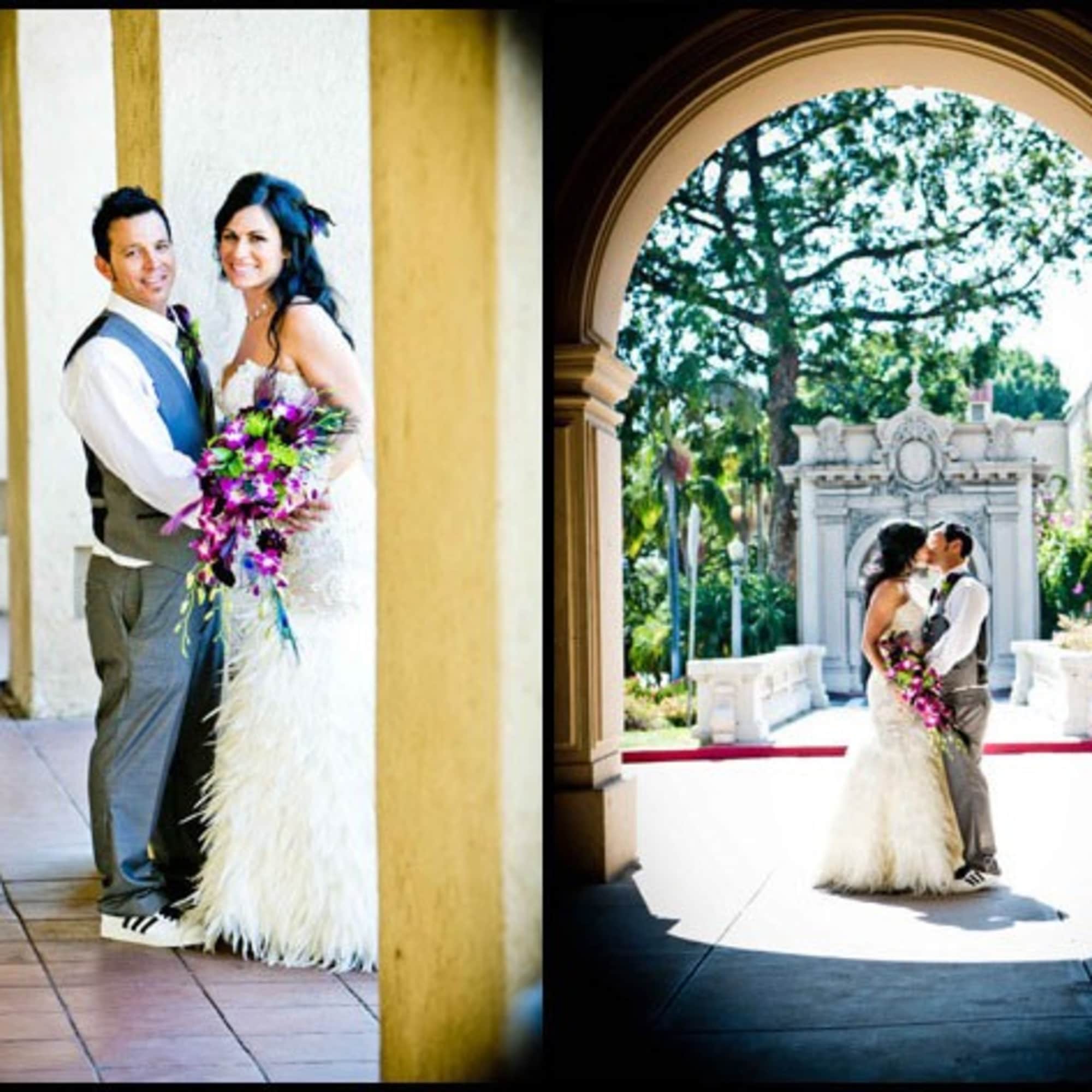 Bride and groom holding a purple bouquet in a wedding setting