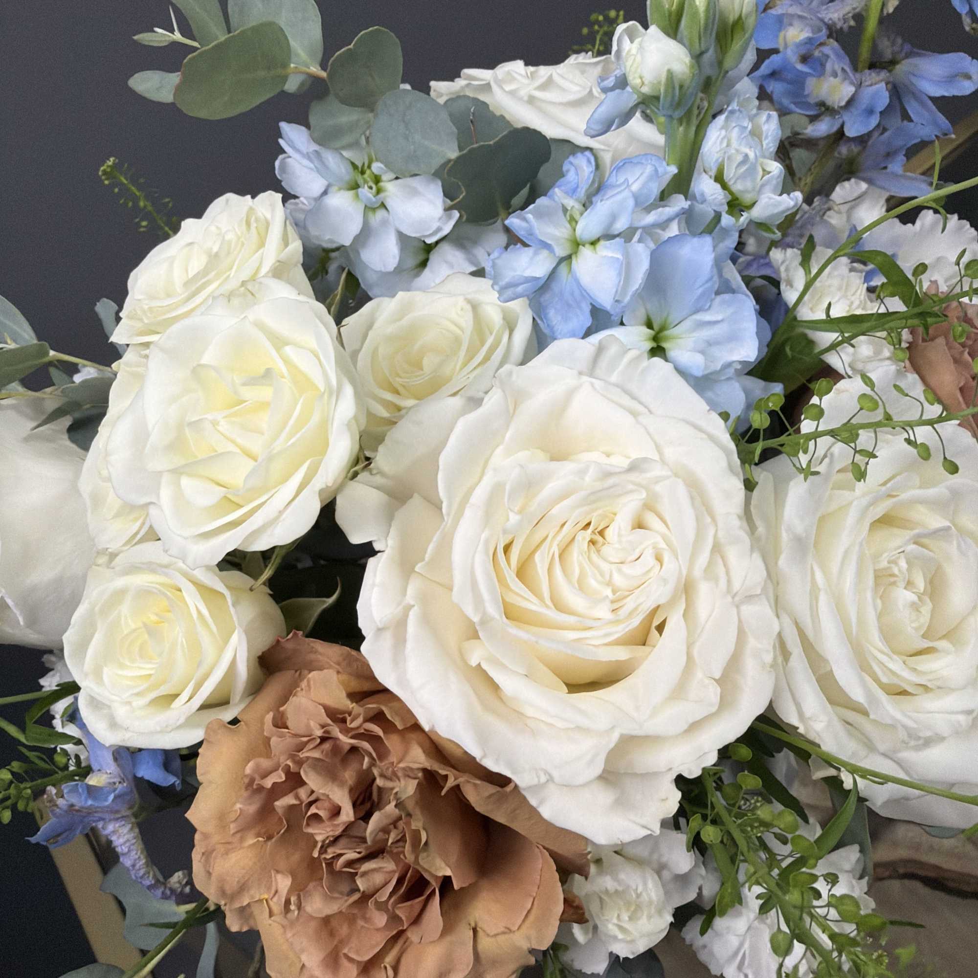 A charming baby boy arrangement featuring soft blue blooms, creamy white roses, photo 3 of 3