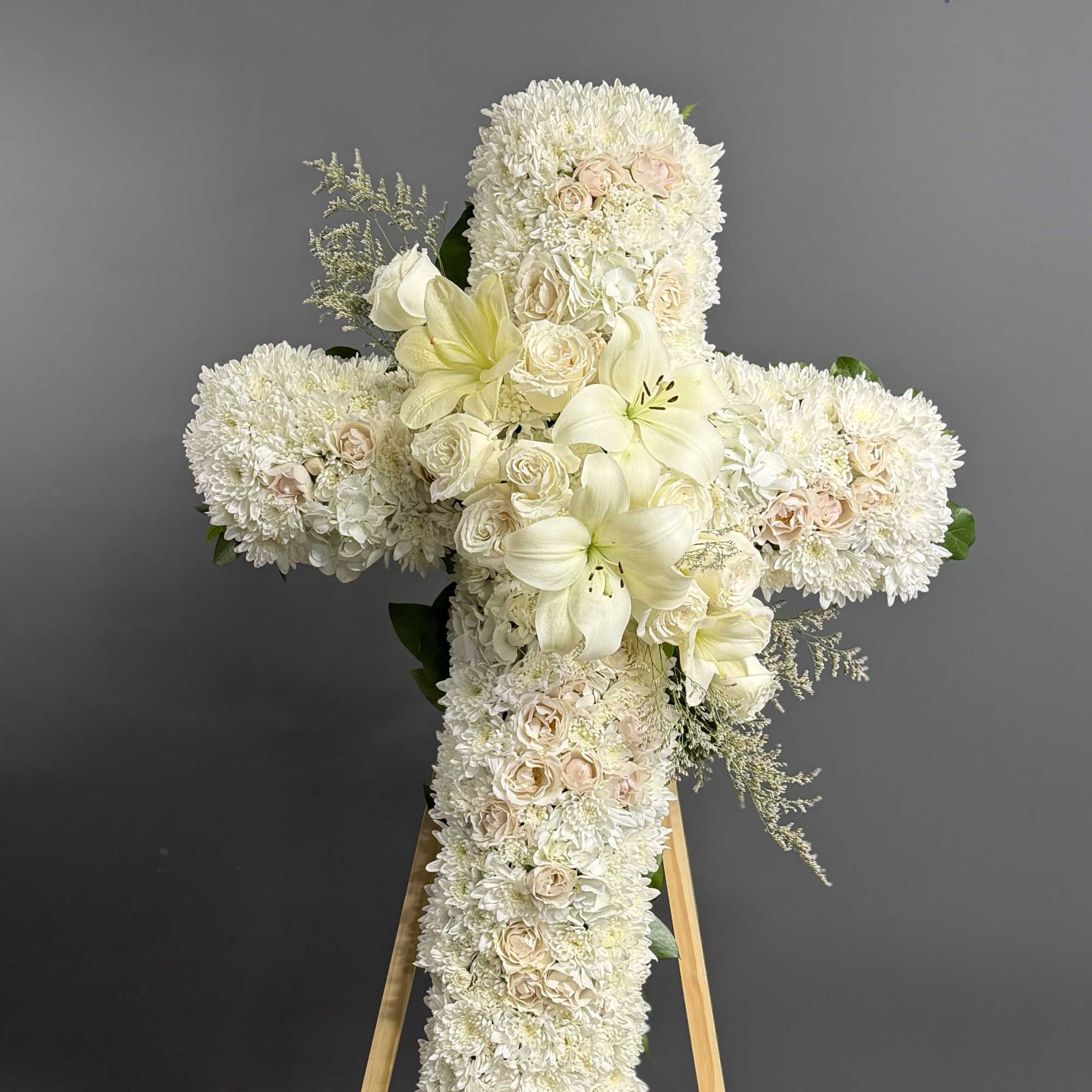 An all white tribute, this white cross funeral spray is pure and, photo 3 of 3