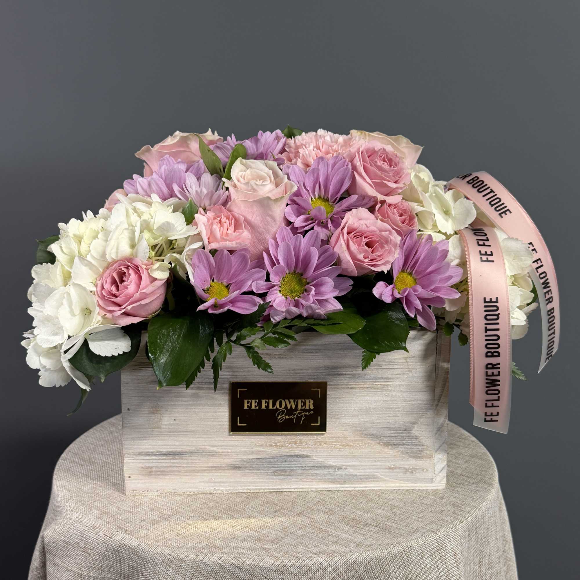 Nestled in a rustic wooden box, delicate lavender chrysanthemums, pristine white roses, photo 4 of 5