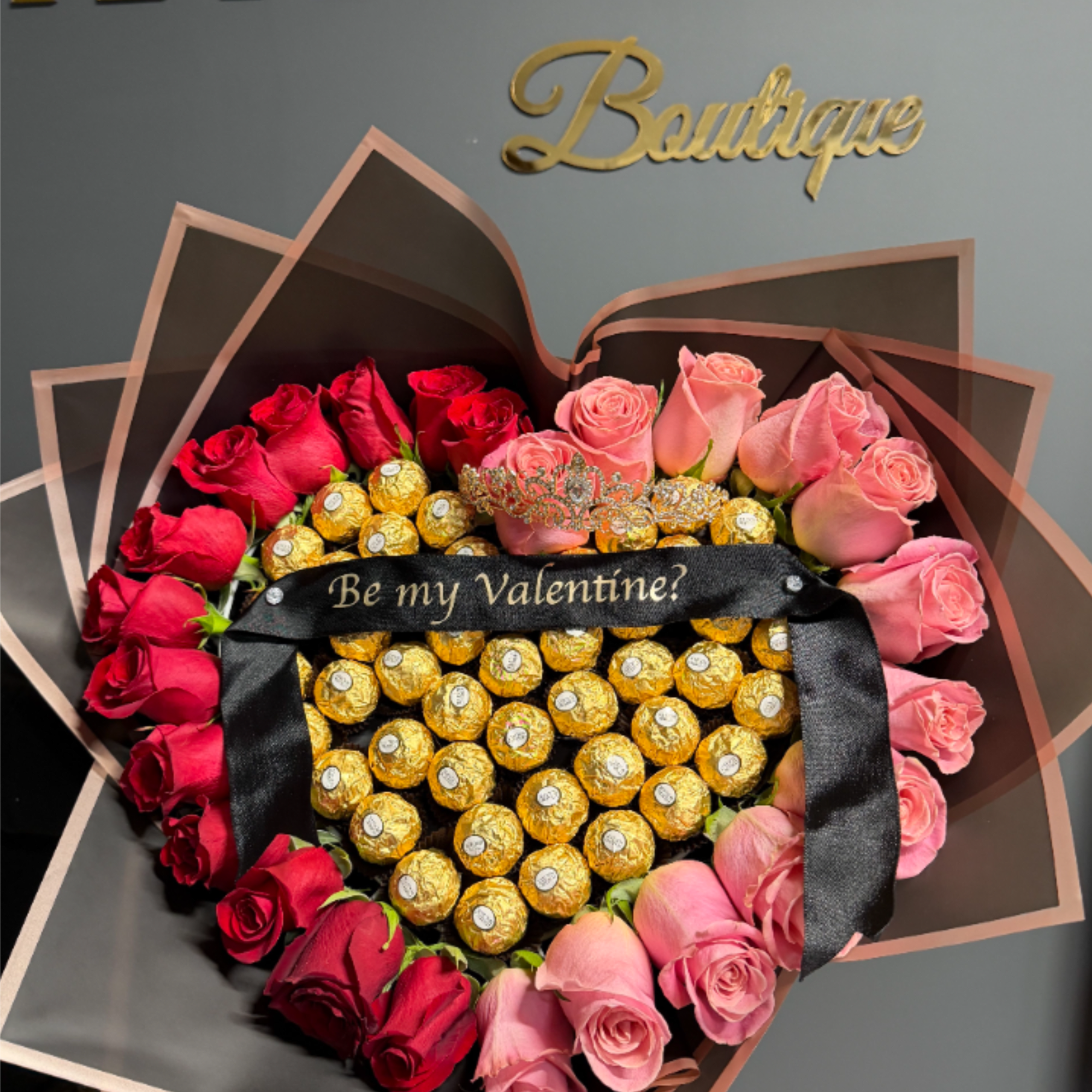 Be Mine Heart is a show-stopping heart-shaped wrapped bouquet designed to captivate