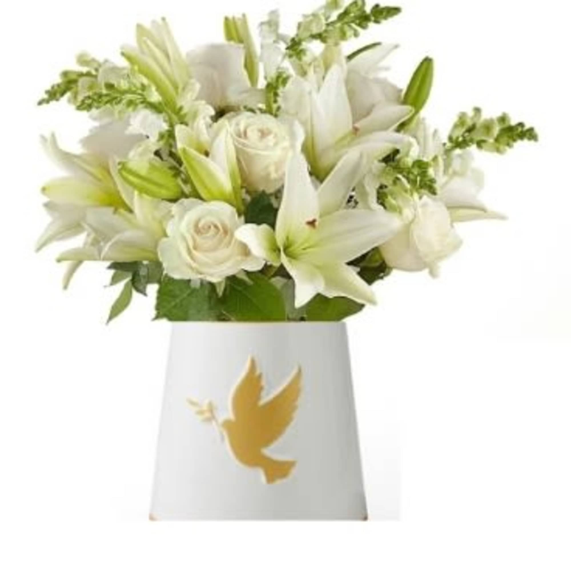 White lilies and roses in a white vase with a gold dove emblem