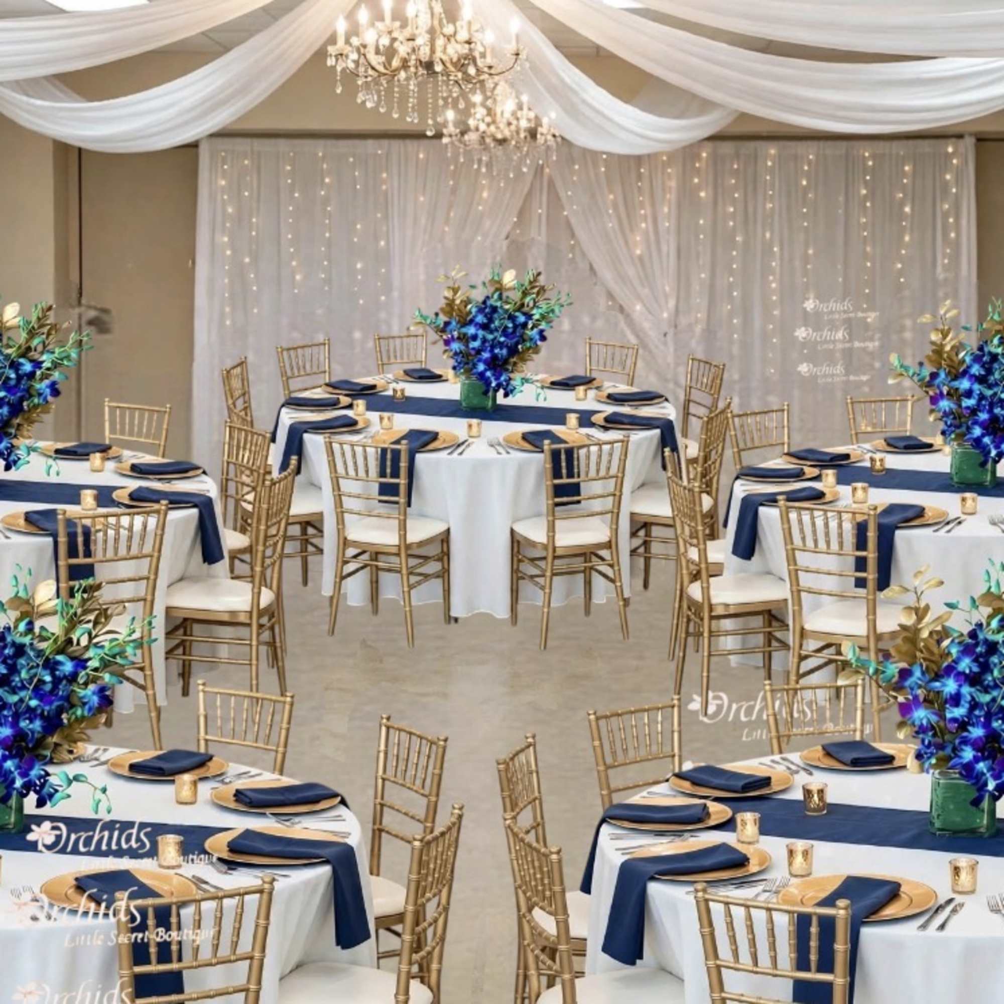 Wedding reception tables with blue floral centerpieces and gold chairs