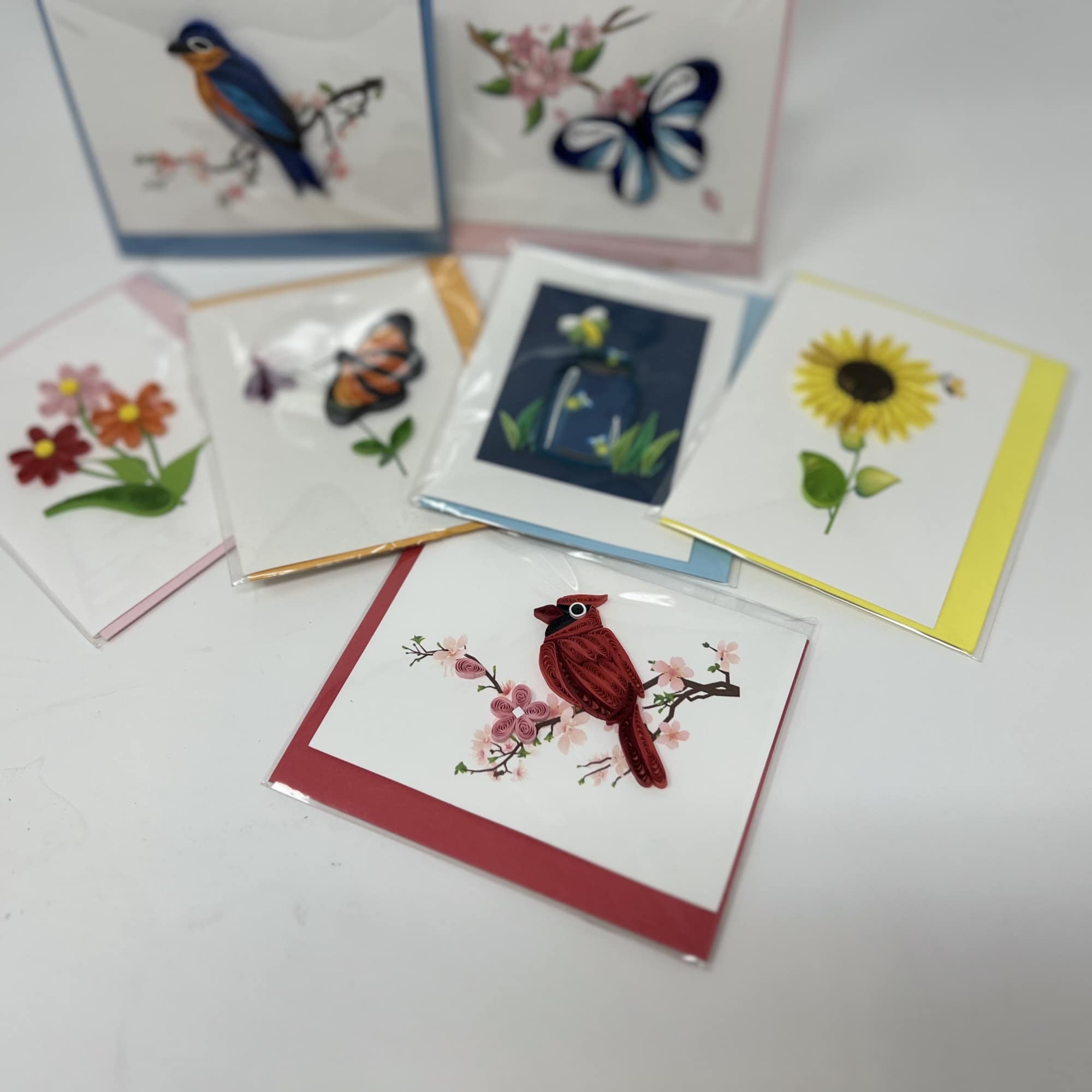 Assorted greeting cards with bird and flower designs