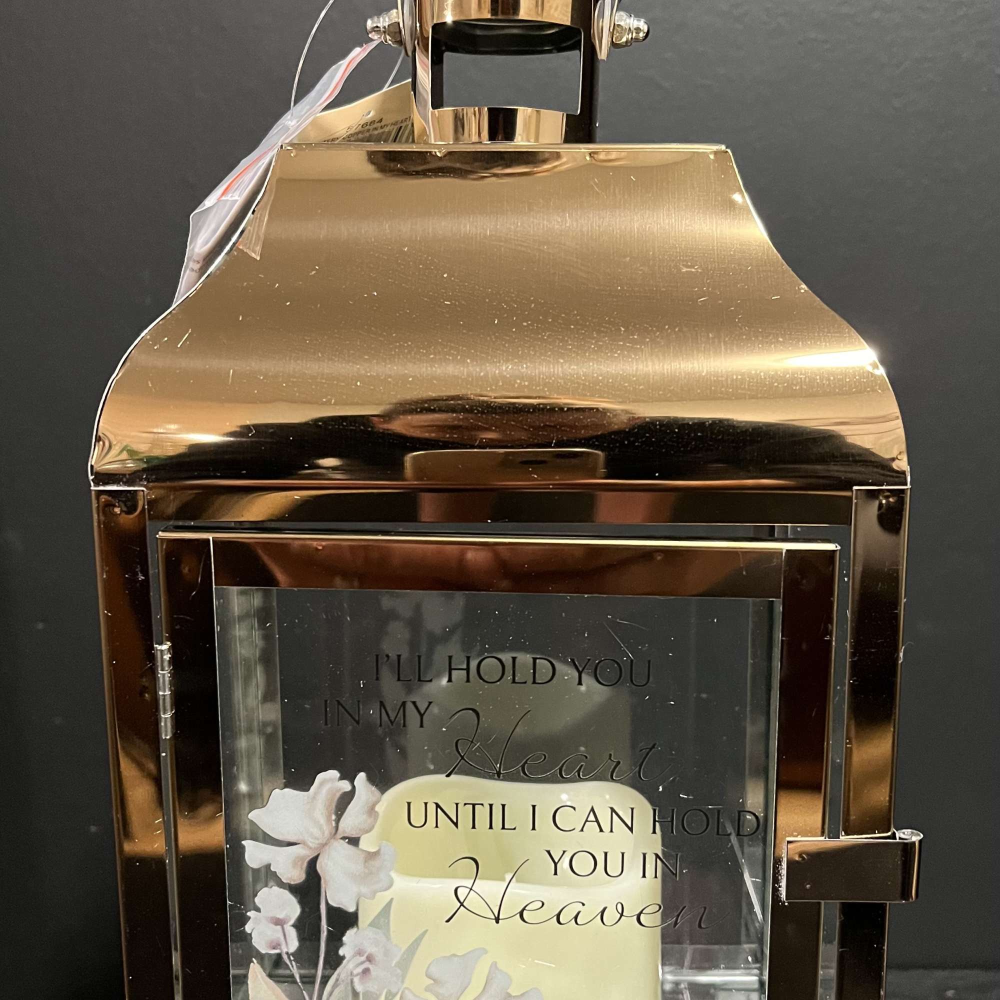 Gold lantern with a sympathy message and floral print insert