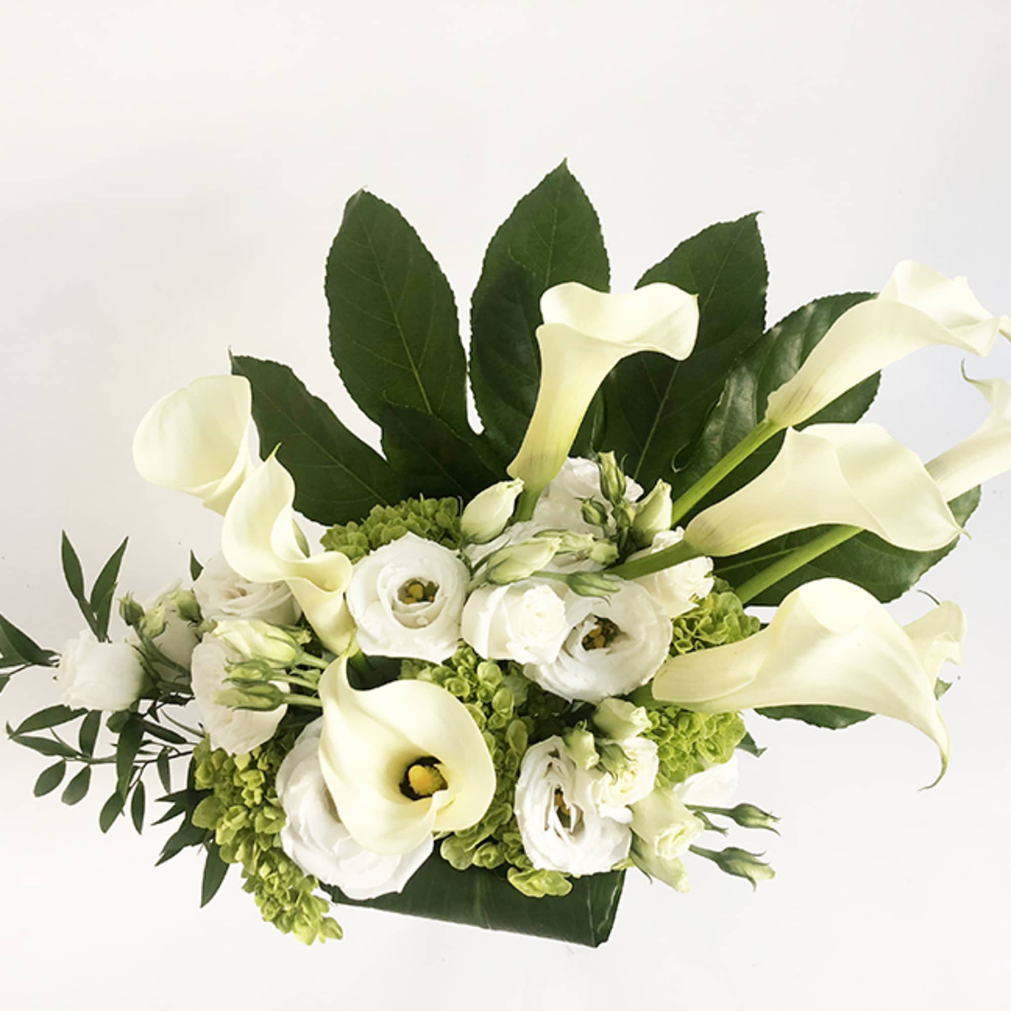 A very elegant design, featuring calla lily, white lisanthus and green hydrangea., photo 5 of 5