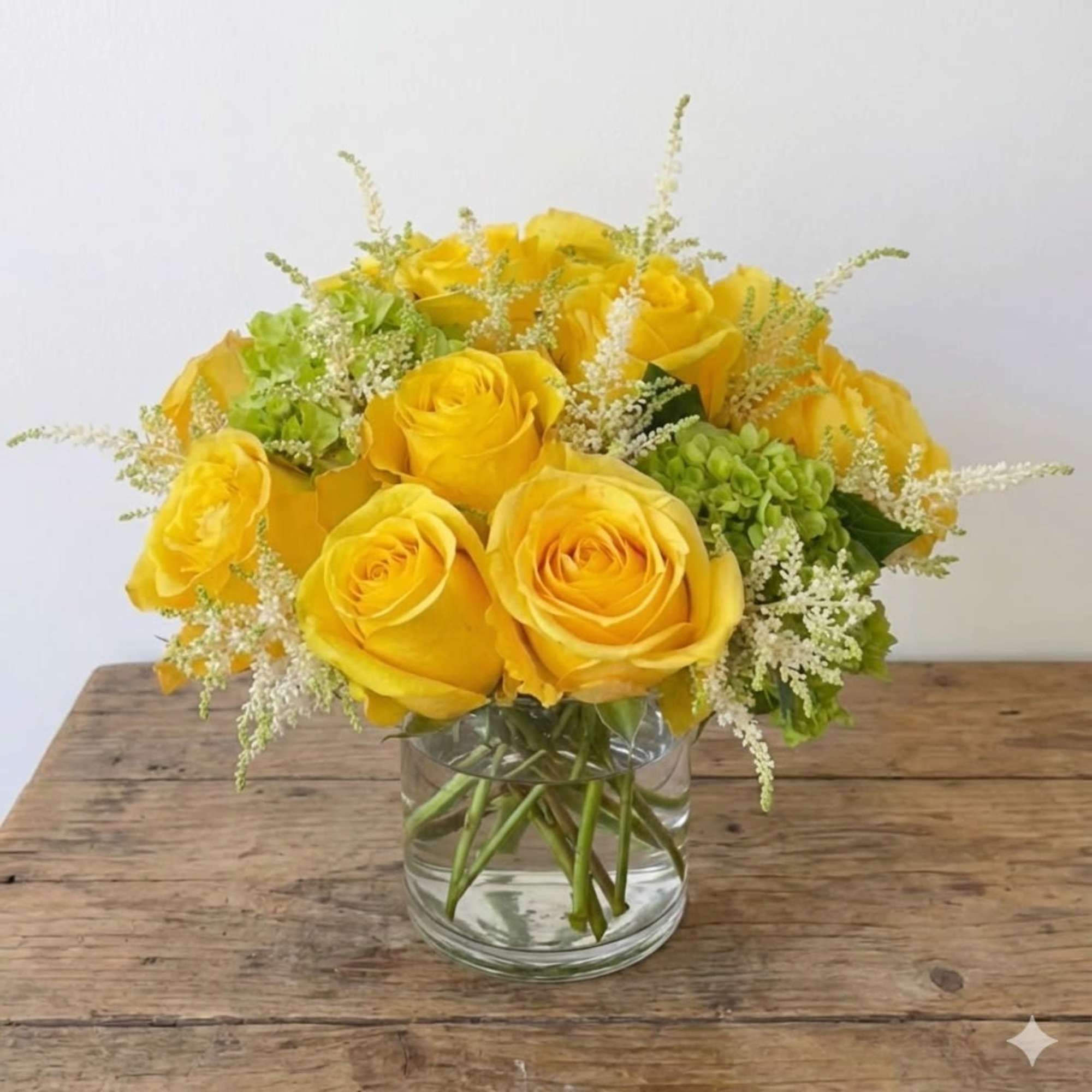 Simplicity is key. This elegant flower arrangement in a vase features the