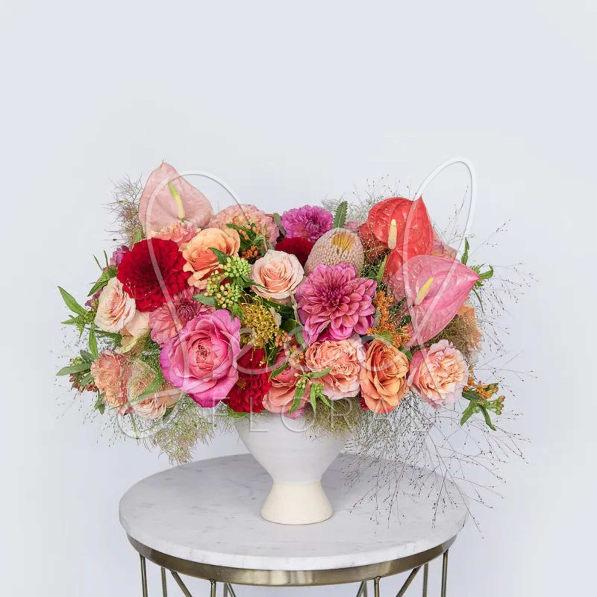 A stunning arrangement which turns up the good vibrations of summer in