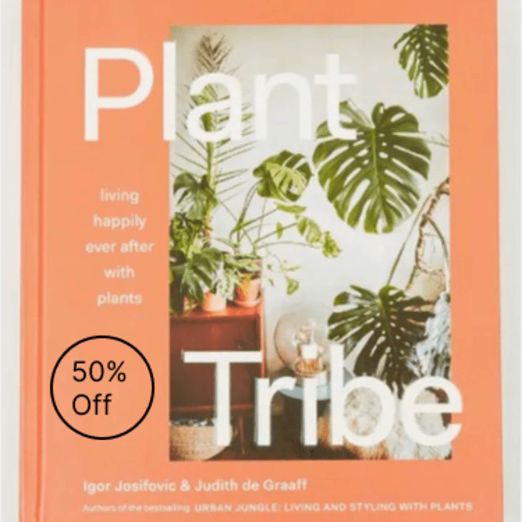 Orange book cover with large white title and tropical plant photos