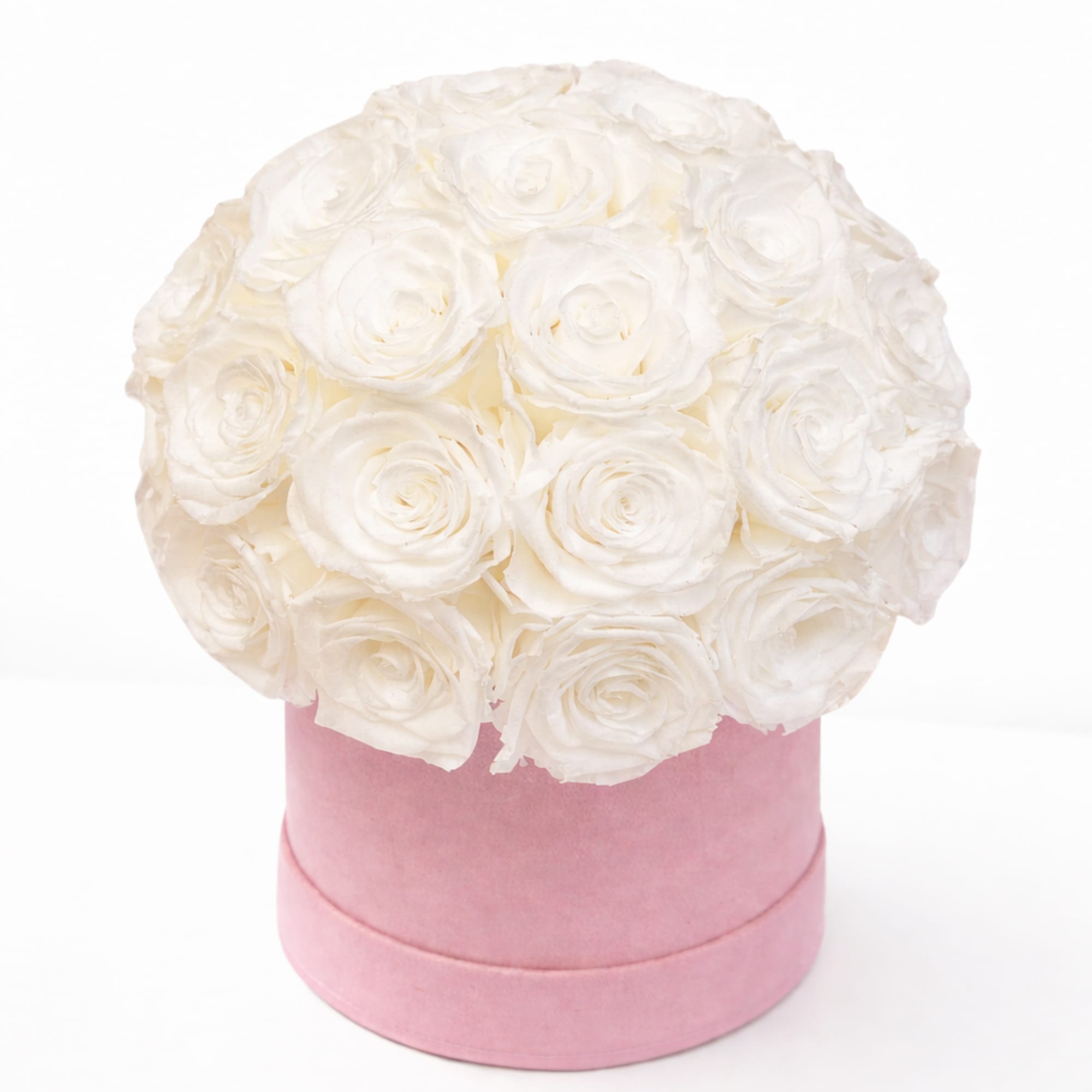 White rose bouquet in a pink round box