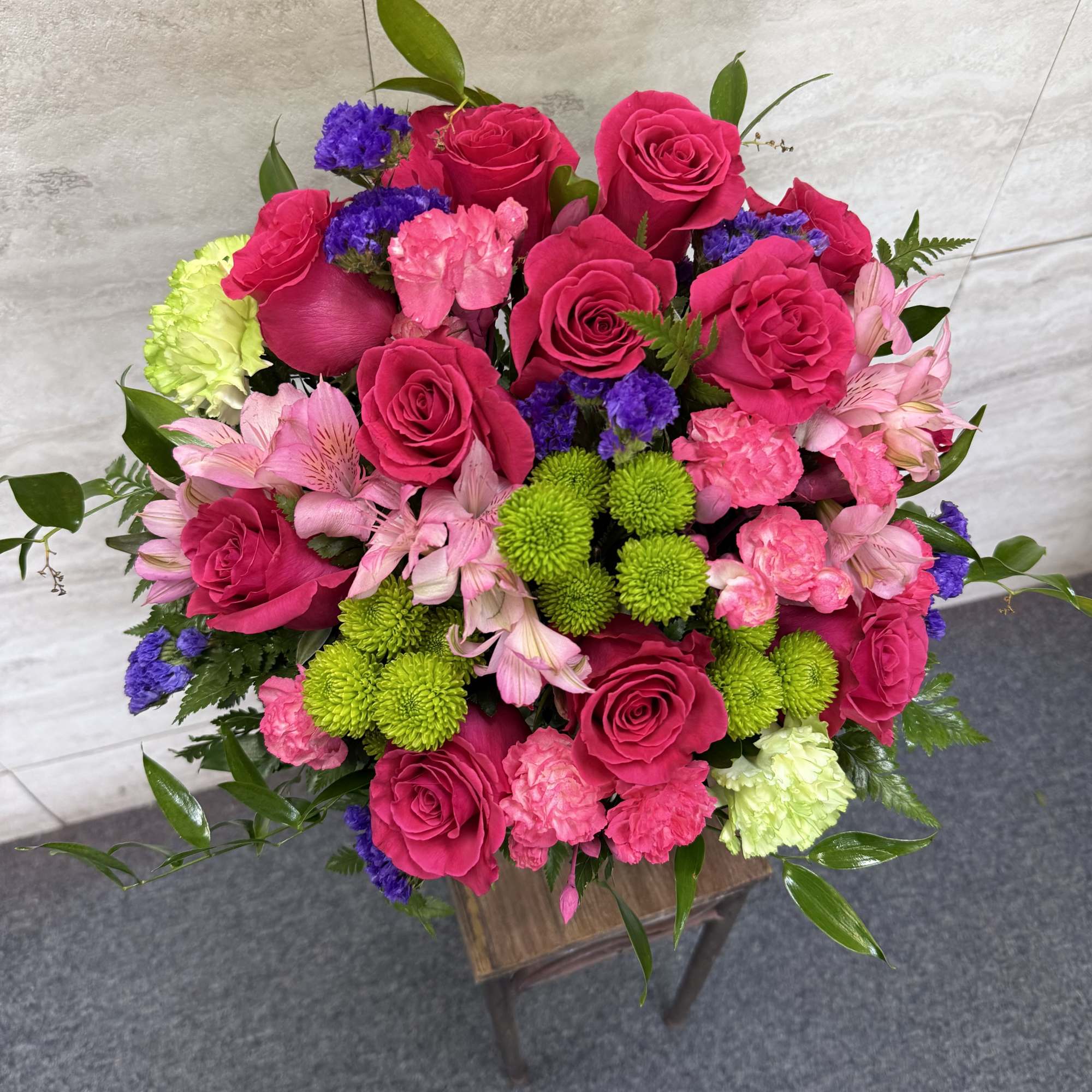 (ALL-ROUND) hot pink florals with green button mums arranged playfully, perfect for
