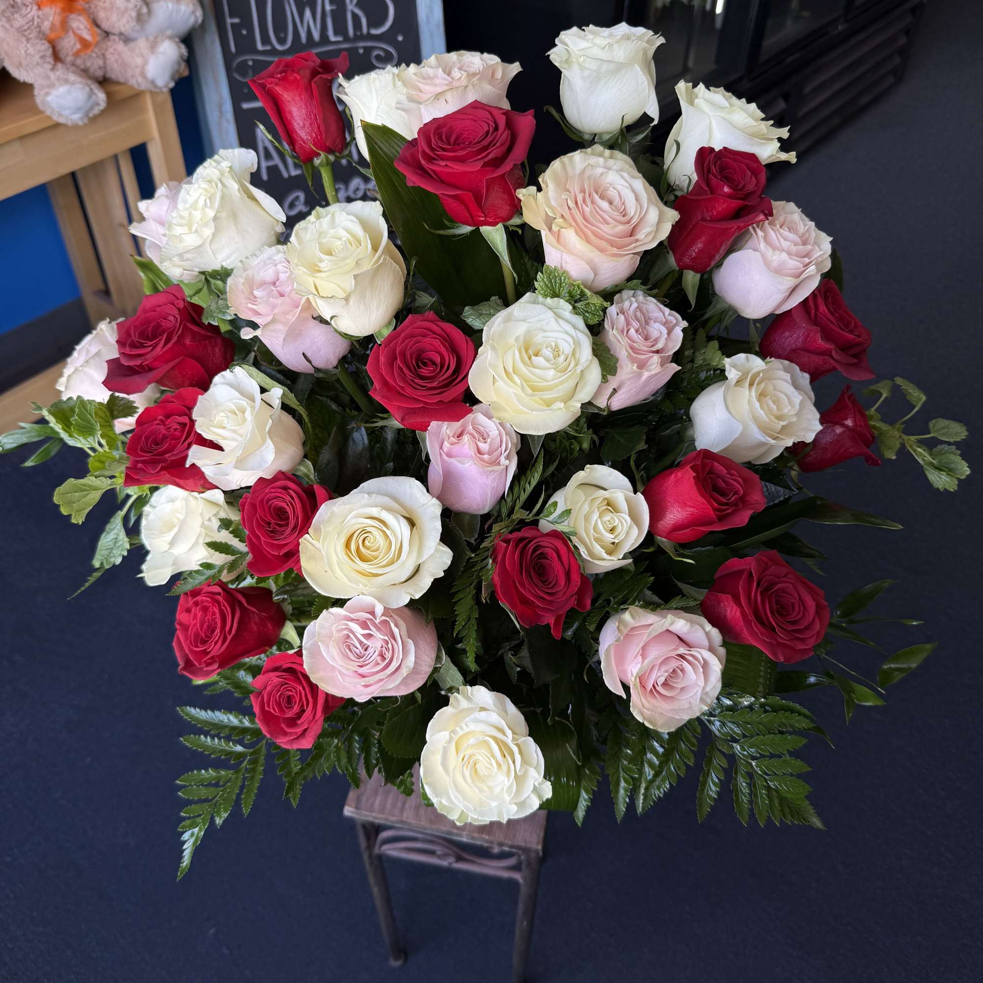 (ALL-ROUND) A 36 full, elegant arrangement of red, white, and light pink, photo 2 of 2