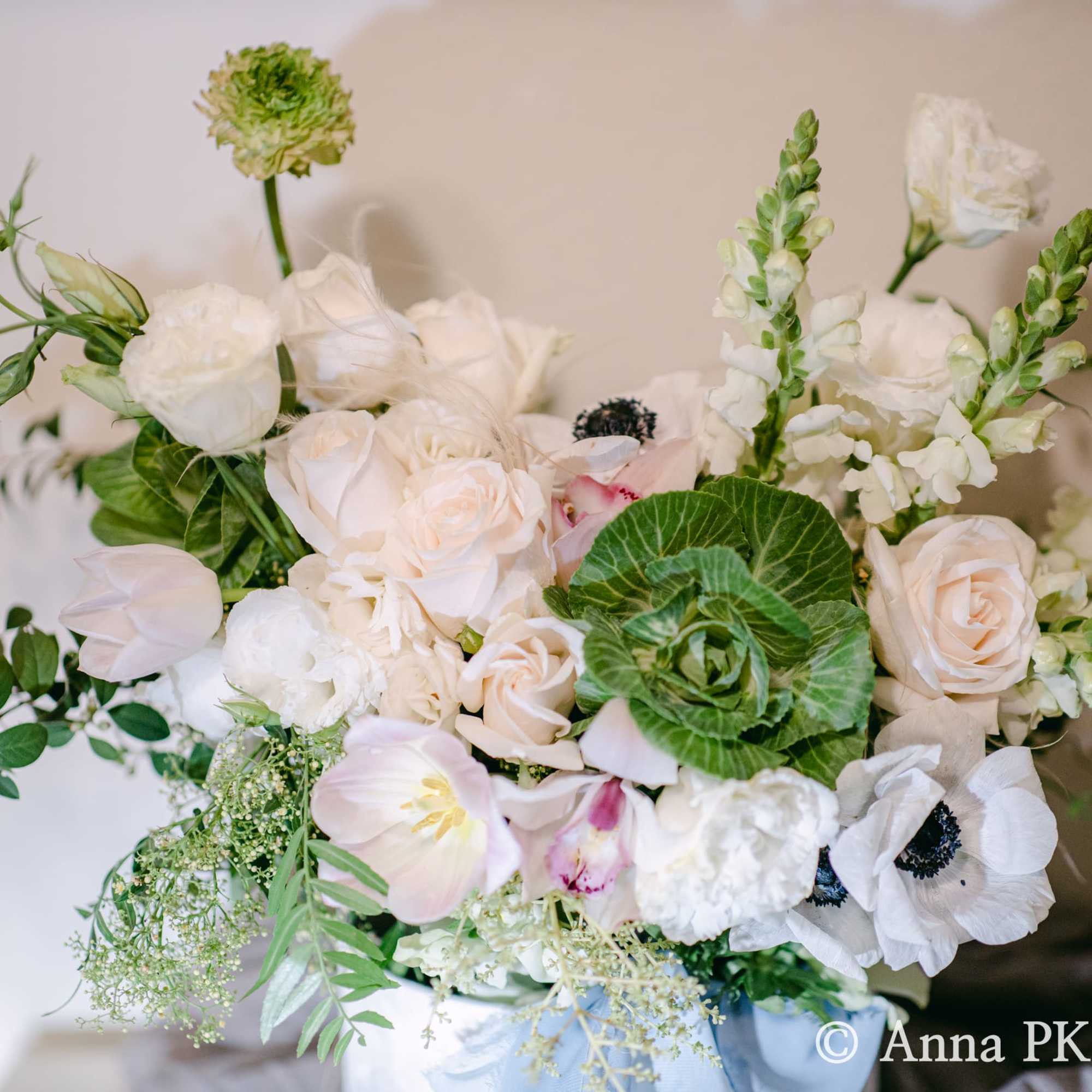 White and pale blush bouquet with roses and snapdragons