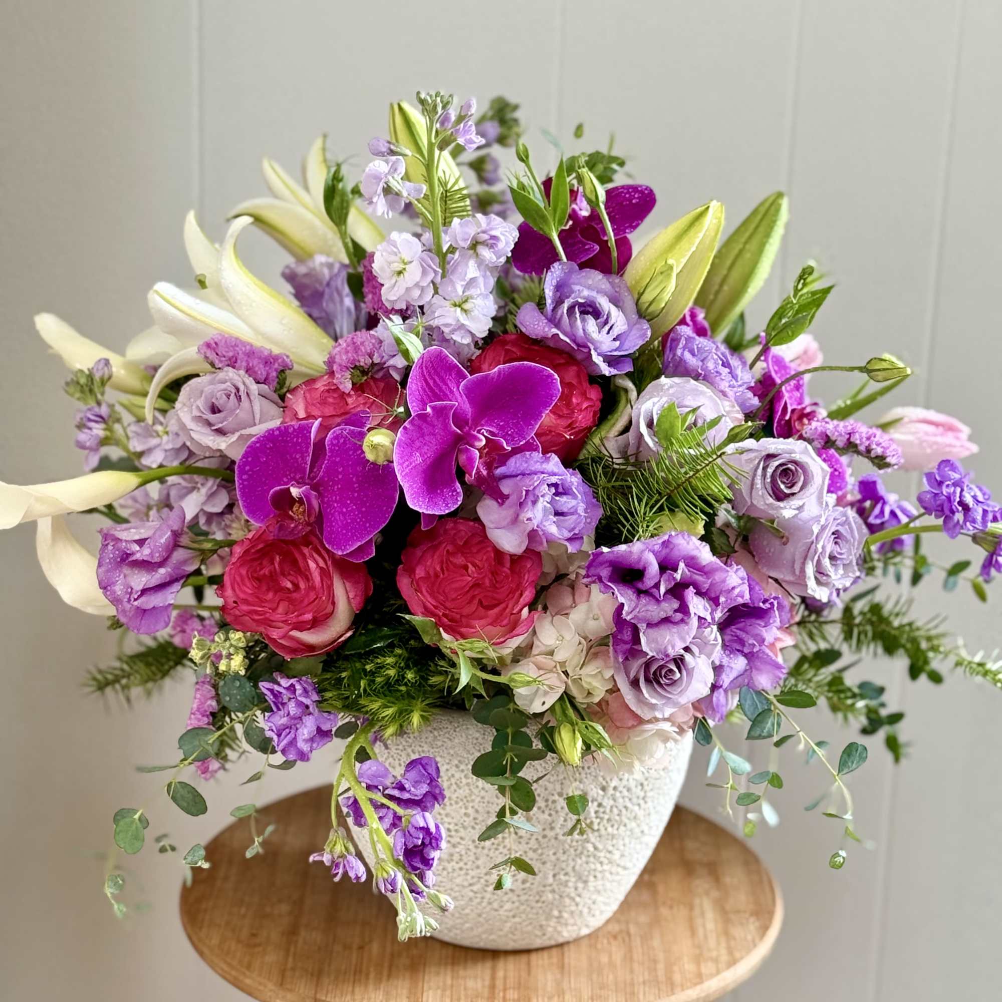 Make a breathtaking statement with  a lavish floral masterpiece designed to, photo 2 of 2