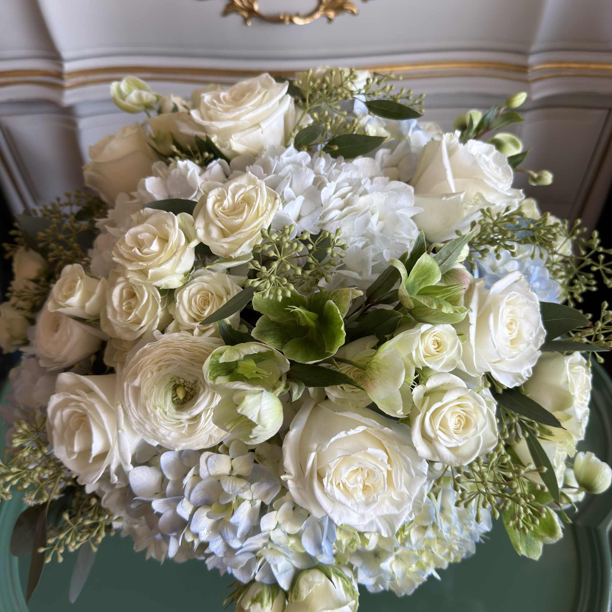 White rose and hydrangea bouquet with green accents, photo 5 of 5