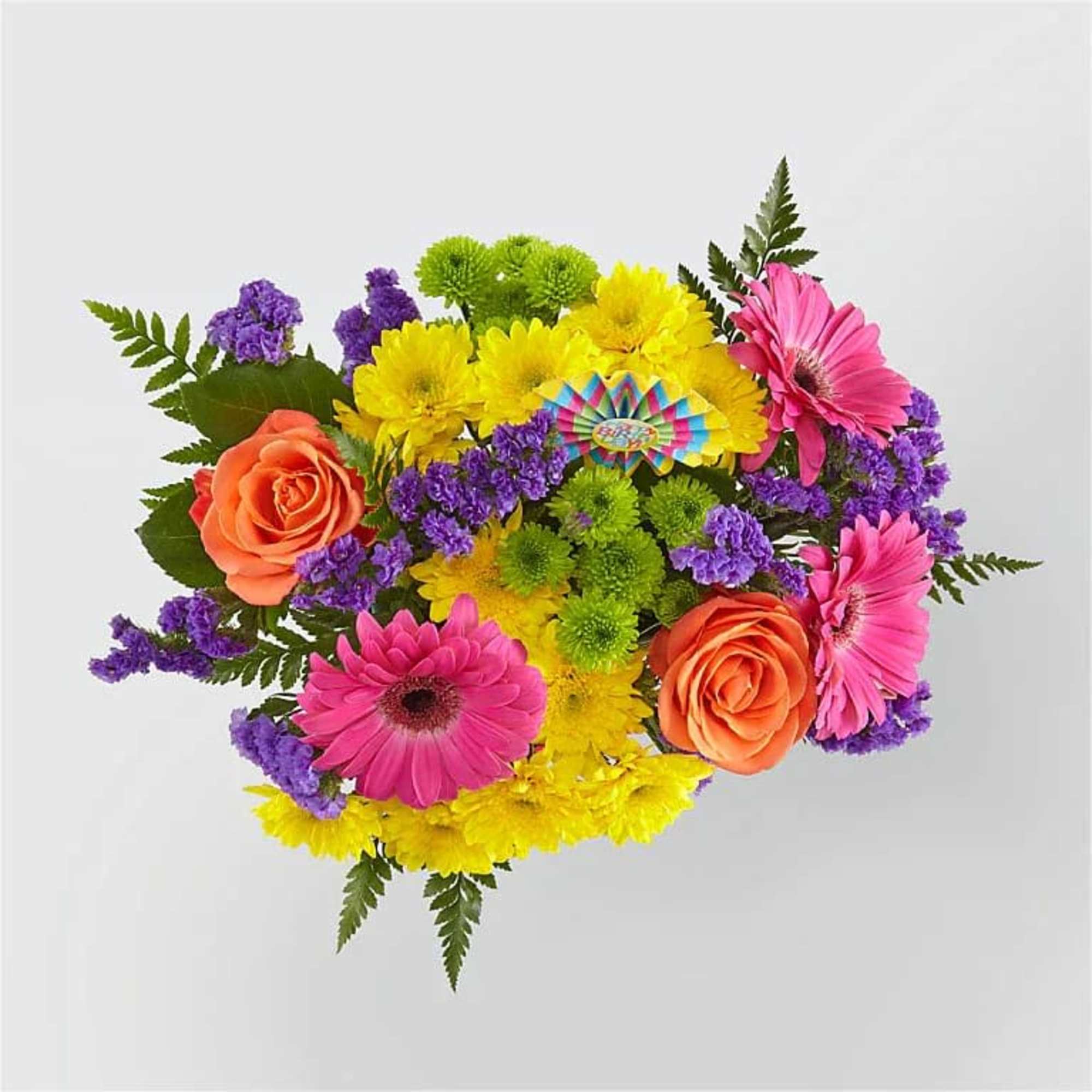 Colorful bouquet with pink gerbera daisies, orange roses, and yellow flowers