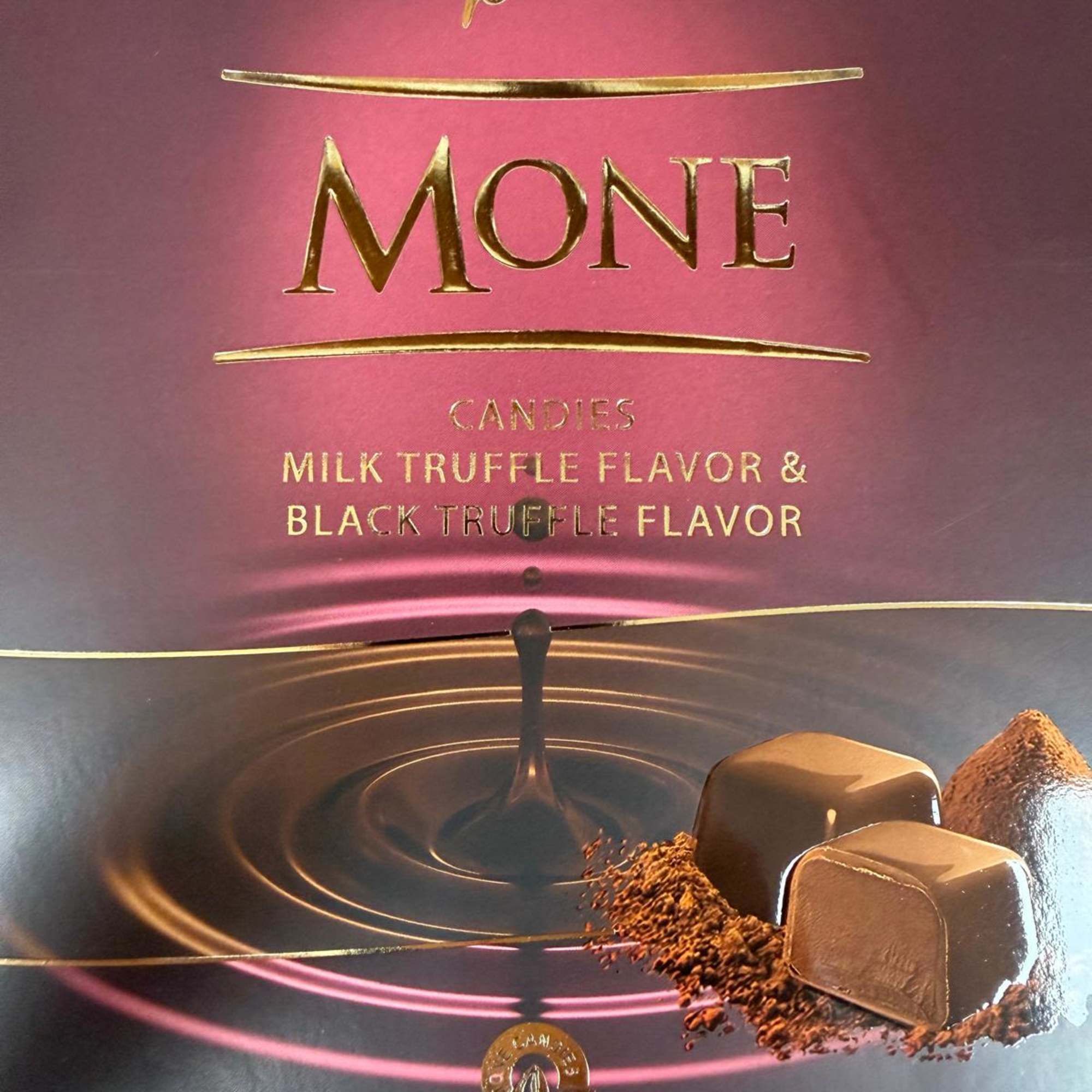 Box of Mone milk and black truffle candies