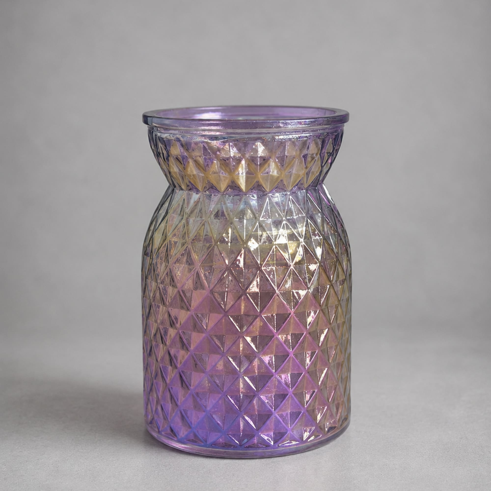 Iridescent purple glass vase with a faceted diamond pattern